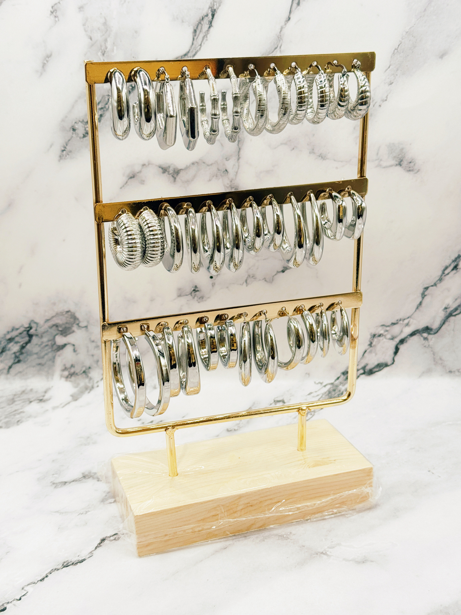 Wholesaler Emily - 18 Stainless Steel Hoop Earrings on Display Stand