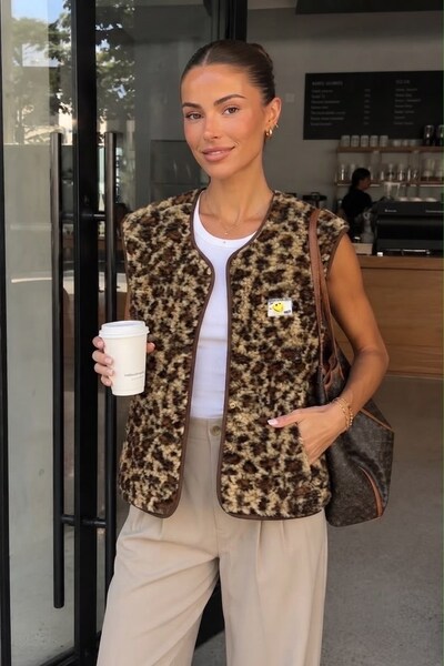 Grossiste Exquiss's - Gilet sans manche motif léopard Grossiste Exquiss's - Gilet sans manche motif léopard