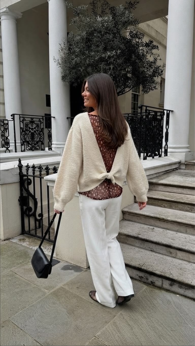 Grossista Exquiss's - Maglione con dettagli sul retro