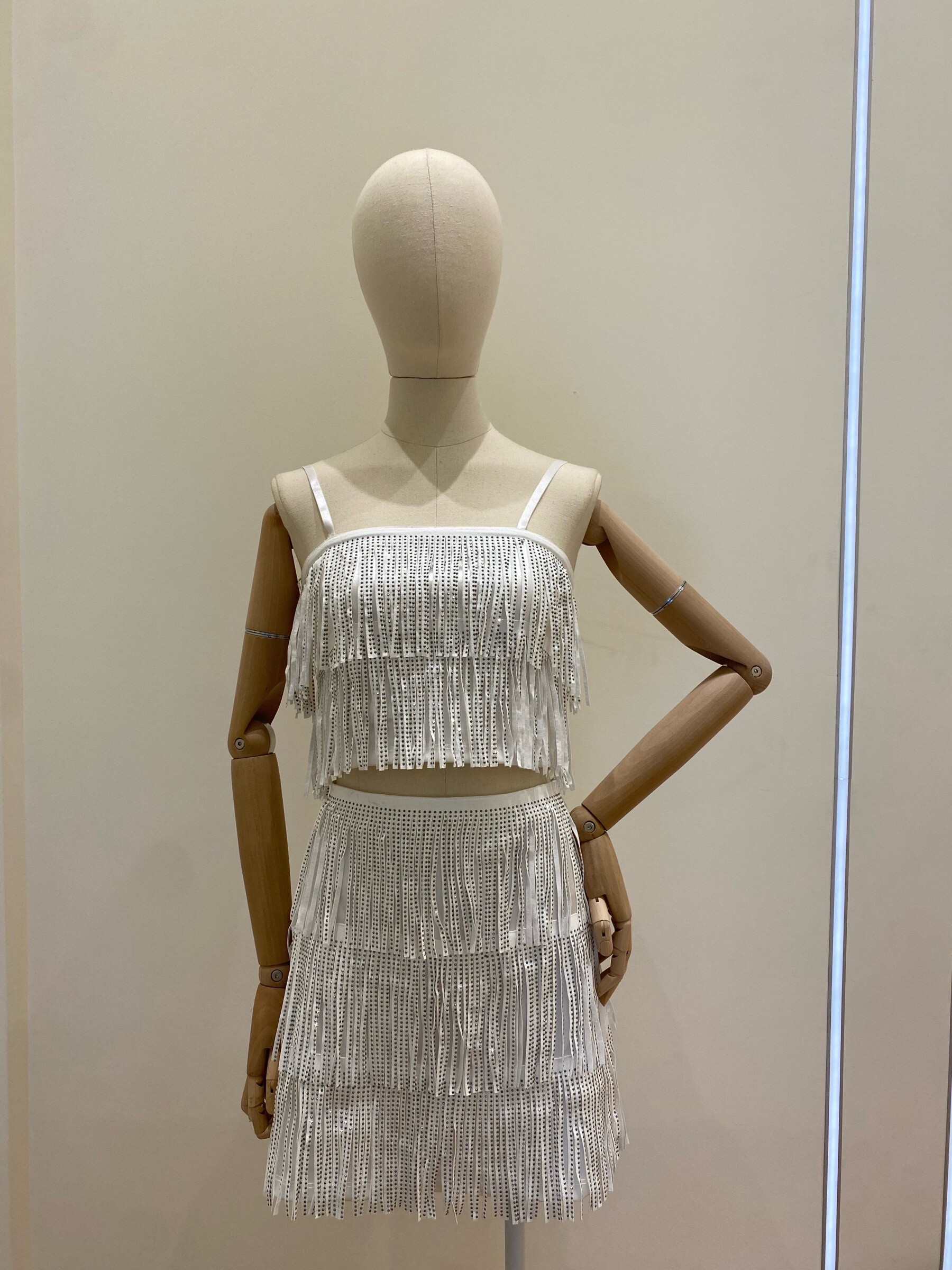Wholesaler Flam Mode - Speeding together, top and matching skirt