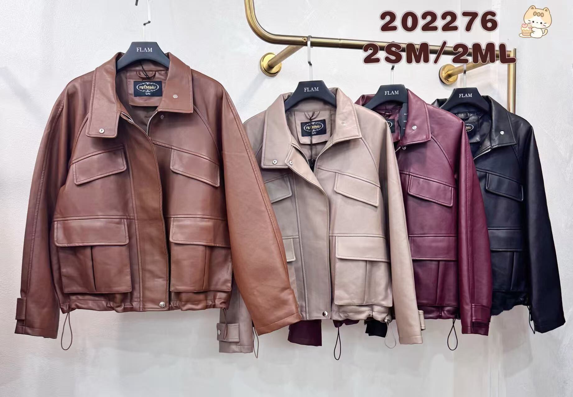 Faux leather jacket with a utility vibe, featuring large flap pockets on the front. Its slightly oversized straight cut and adjustable drawstring hem provide optimal comfort and a bold look.