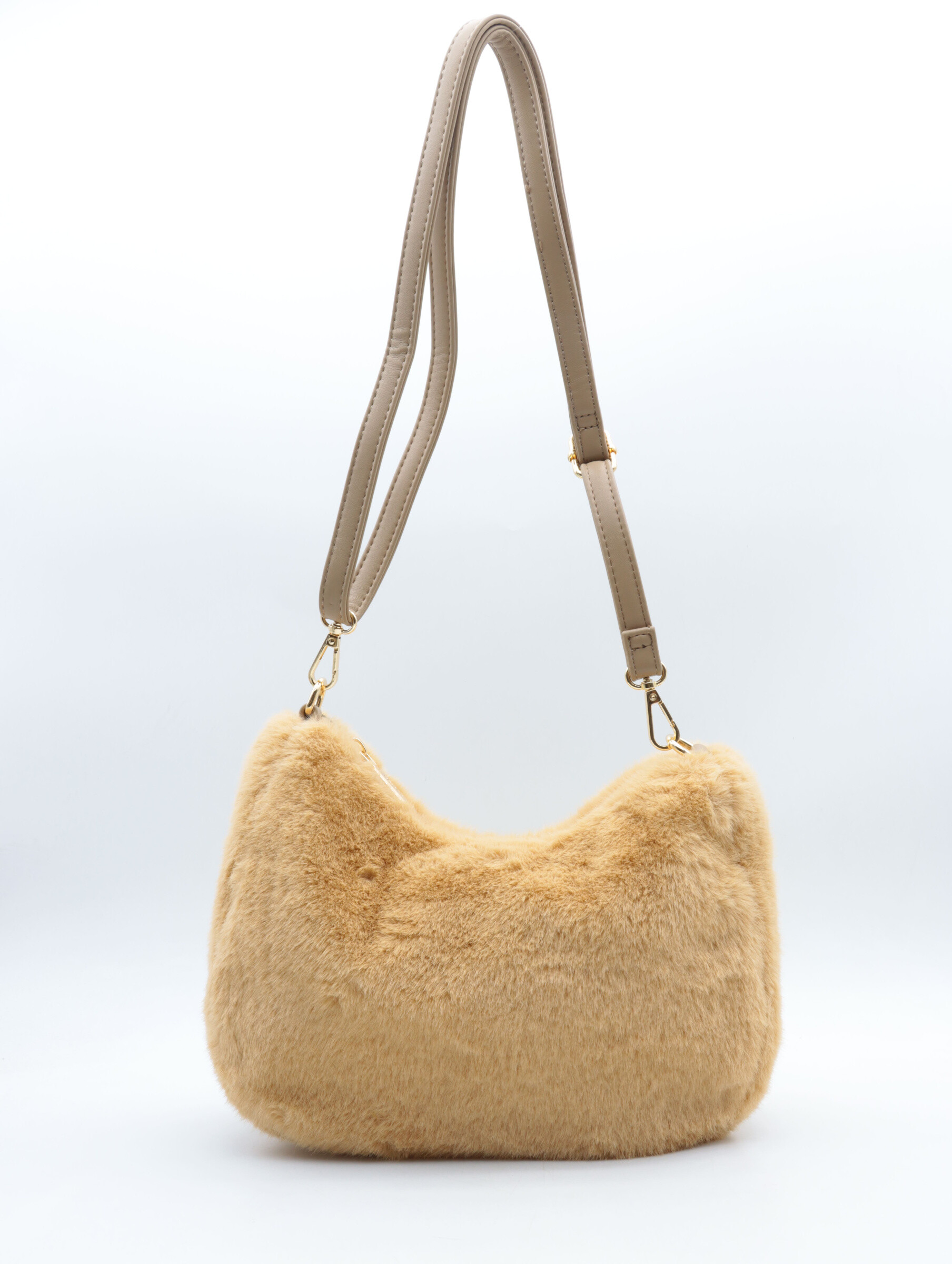 Sac bandoulière à fourrure
bandoulière réglable et amovible
fermeture par le haut zippée
poche intérieur simple
doublure imprimé fleur
L29*H19*P11 cm