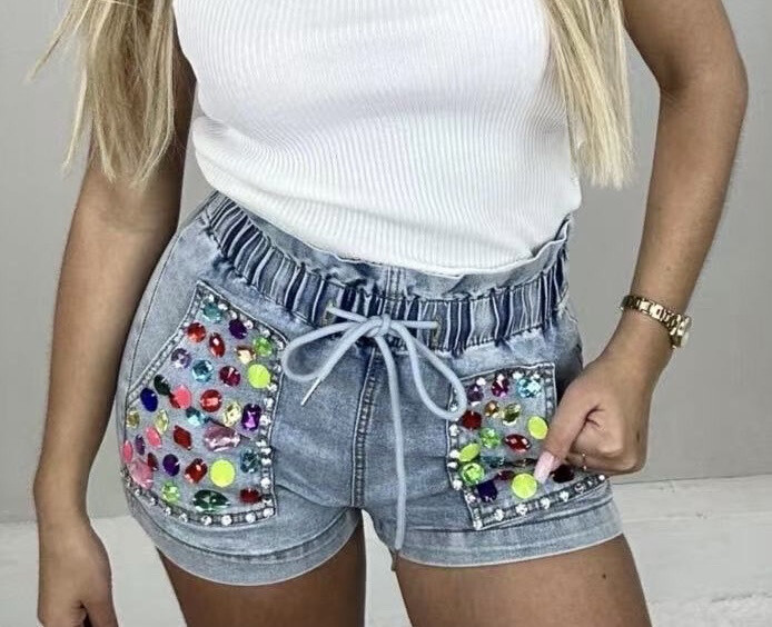 Grossista Giorgia - pantaloncini di jeans con pietre e filo in vita