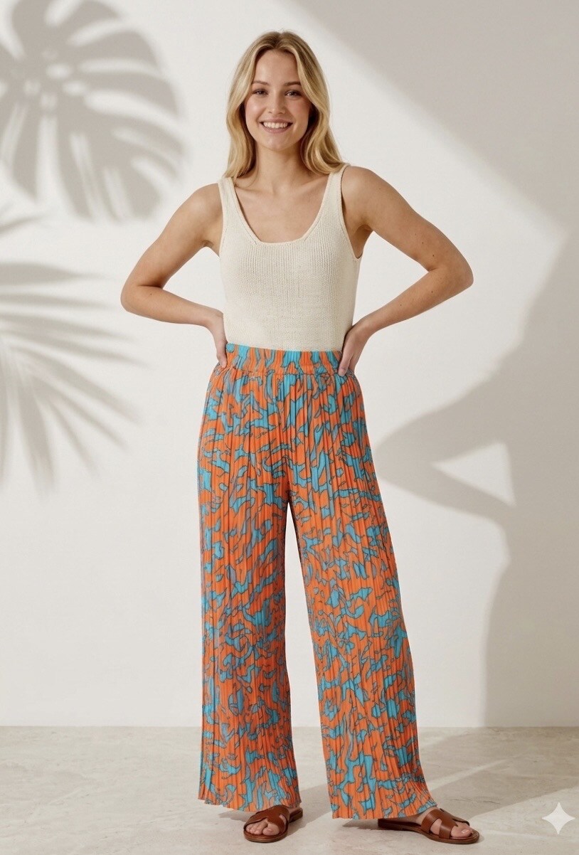 Mayorista Graciela Paris - Pantalón estampado animal. Plisado. Ancho y fluido