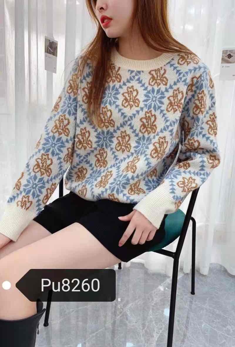 Grossiste Graciela Paris - Pull col rond. jacquard de motifs floraux et geometiques