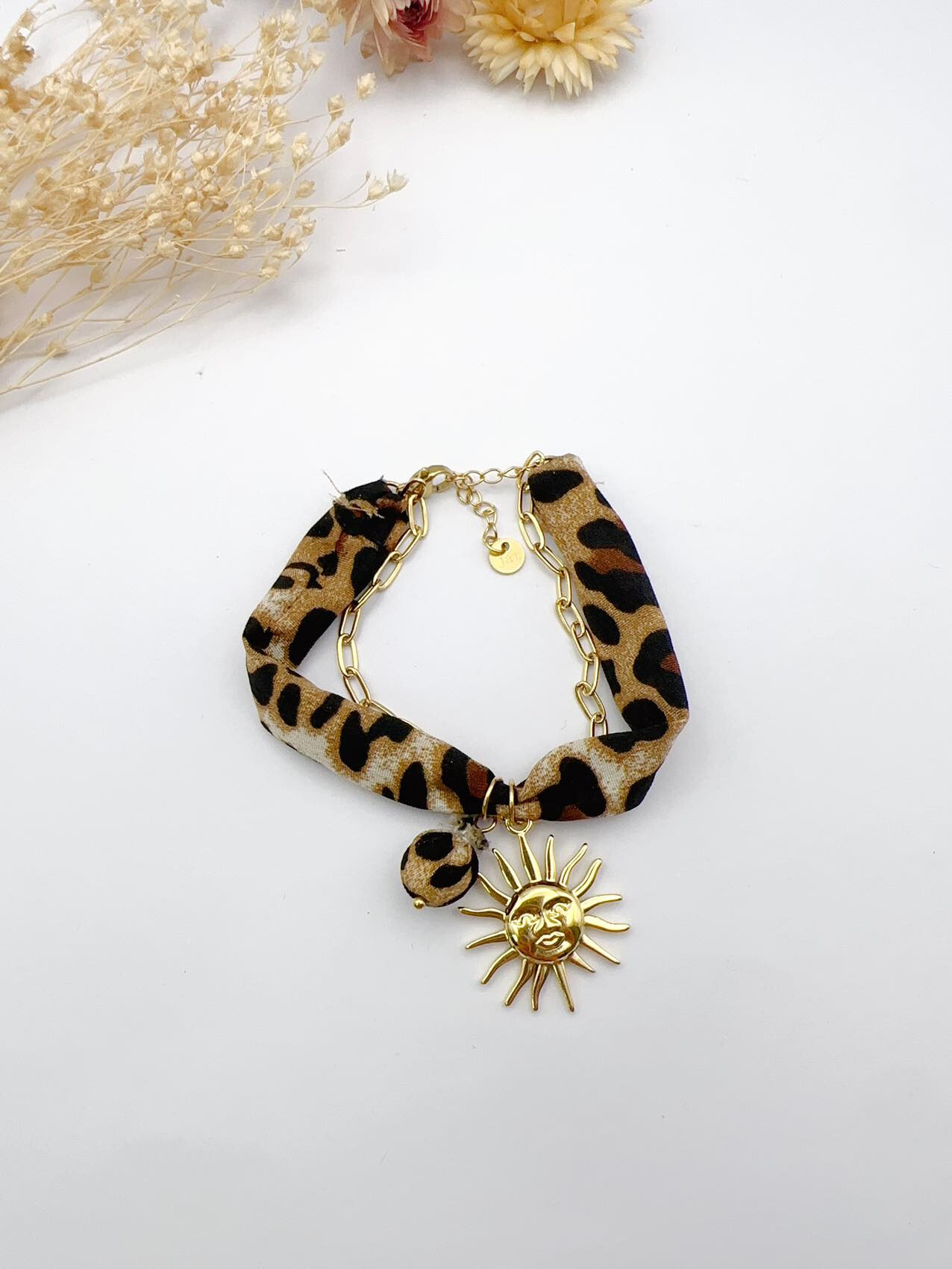 Wholesaler H&T Bijoux - Stainless steel and resin leopard bracelet.