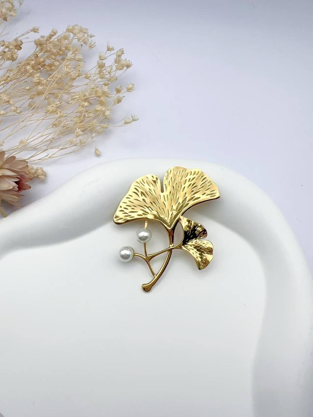 Grossiste H&T Bijoux - Broche en acier inoxydable.