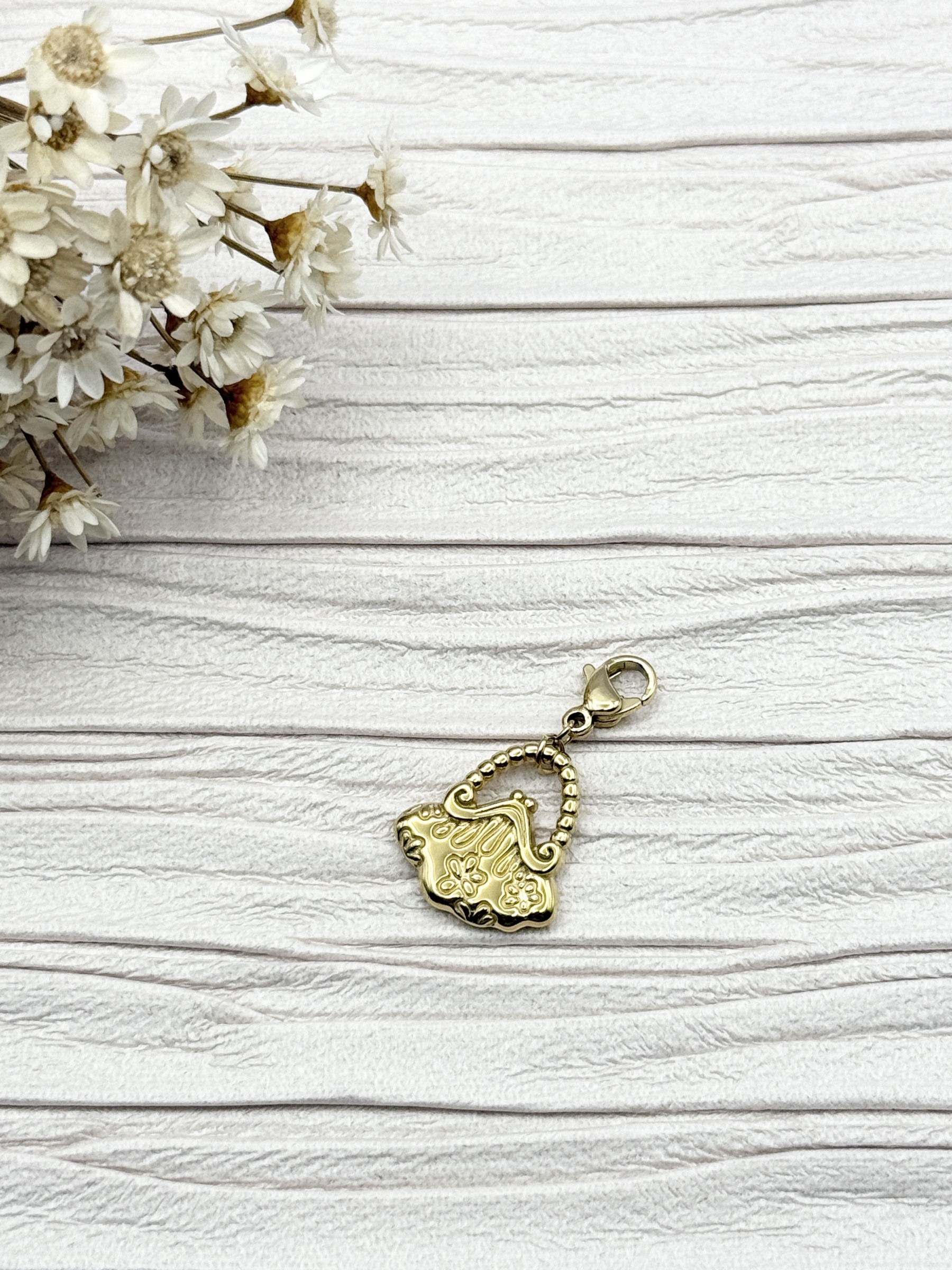 Mayorista H&T Bijoux - Encanto de acero inoxidable.