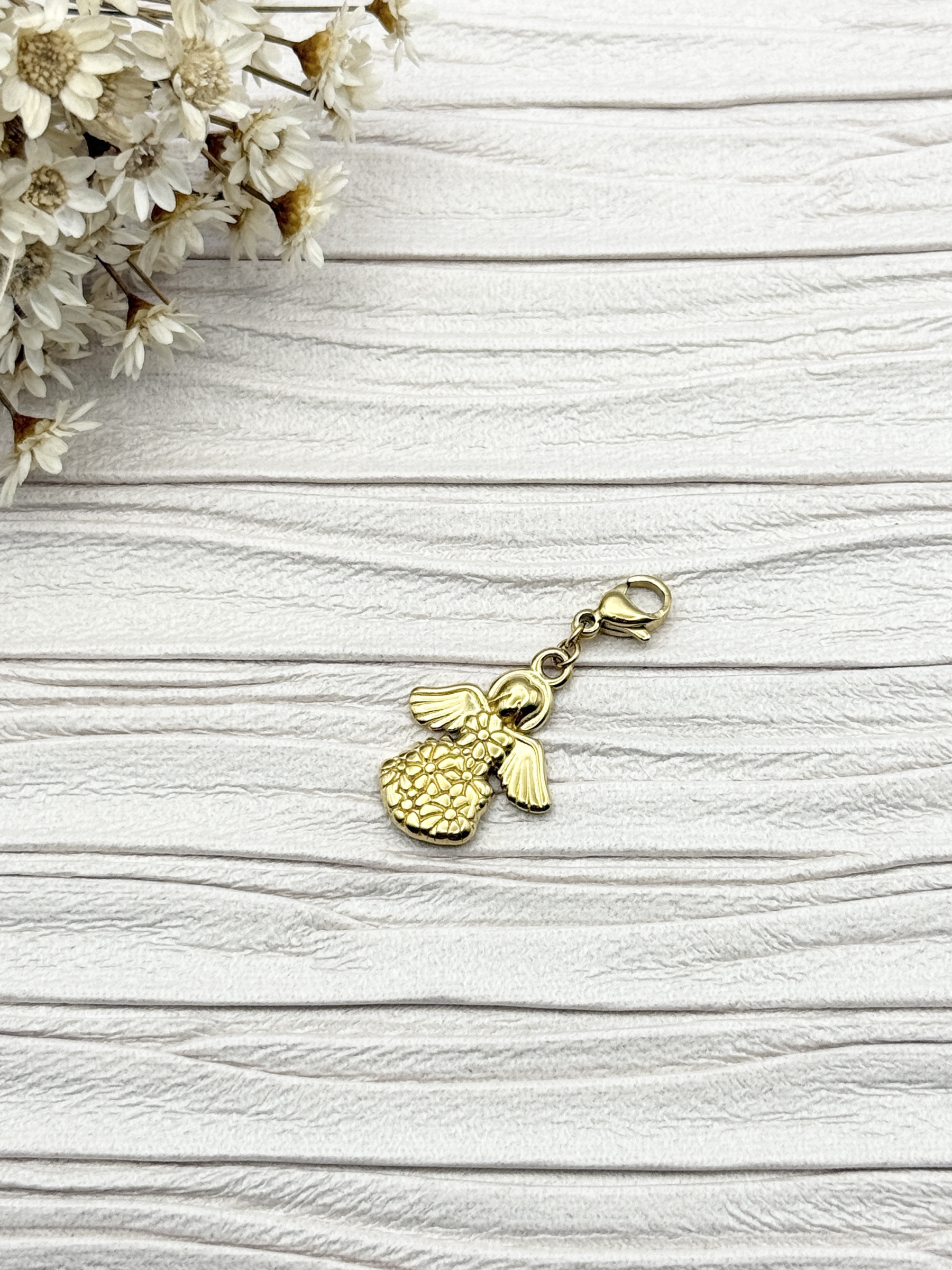 Mayorista H&T Bijoux - Encanto de acero inoxidable.