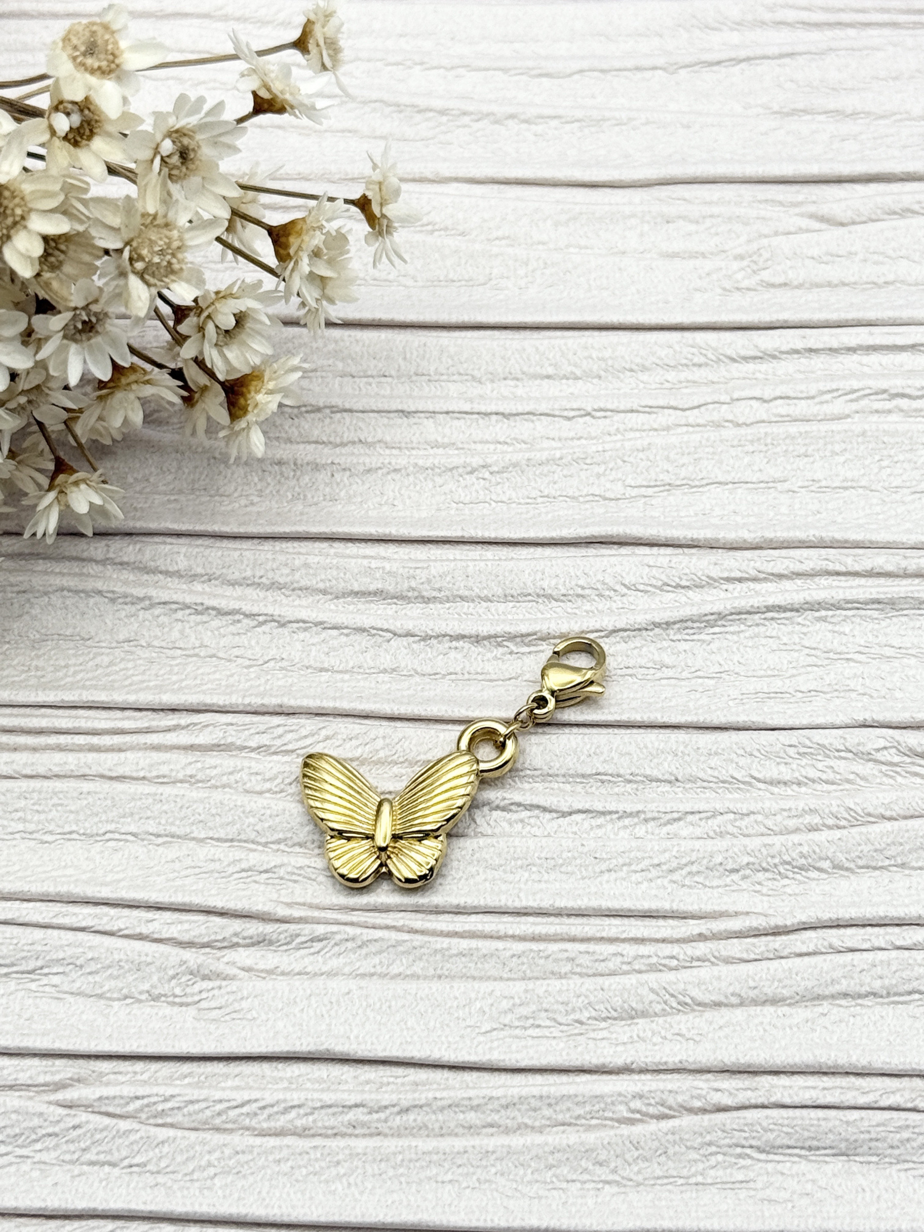 Mayorista H&T Bijoux - Encanto de acero inoxidable.