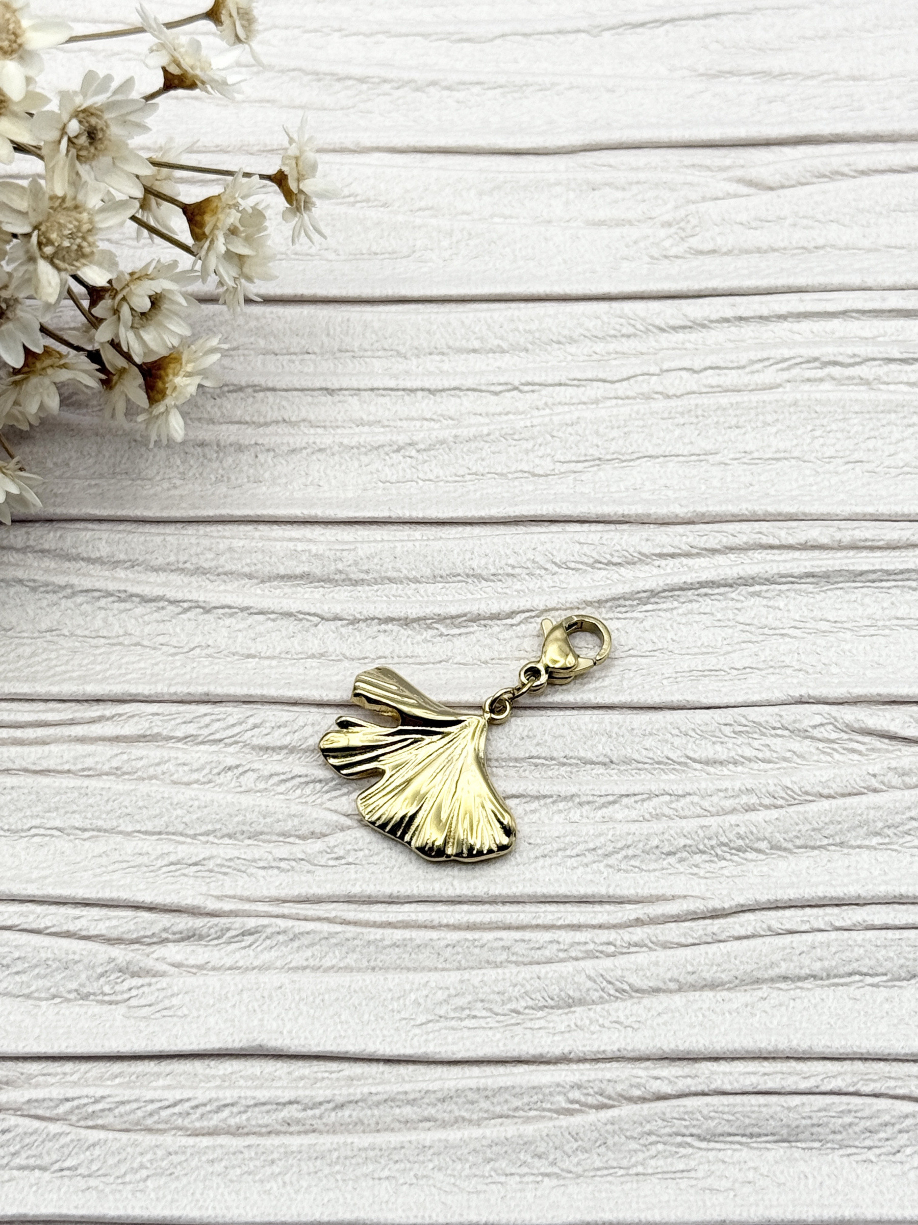 Mayorista H&T Bijoux - Encanto de acero inoxidable.