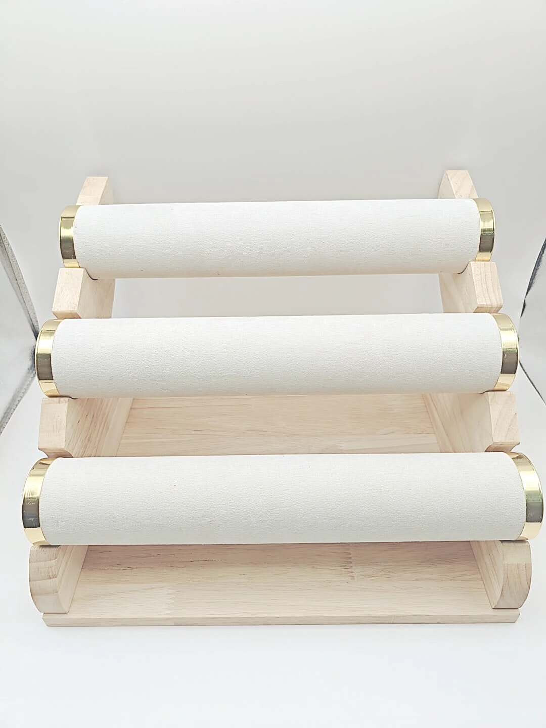 Wholesaler H&T Bijoux - Triple level wooden bracelet shelf.