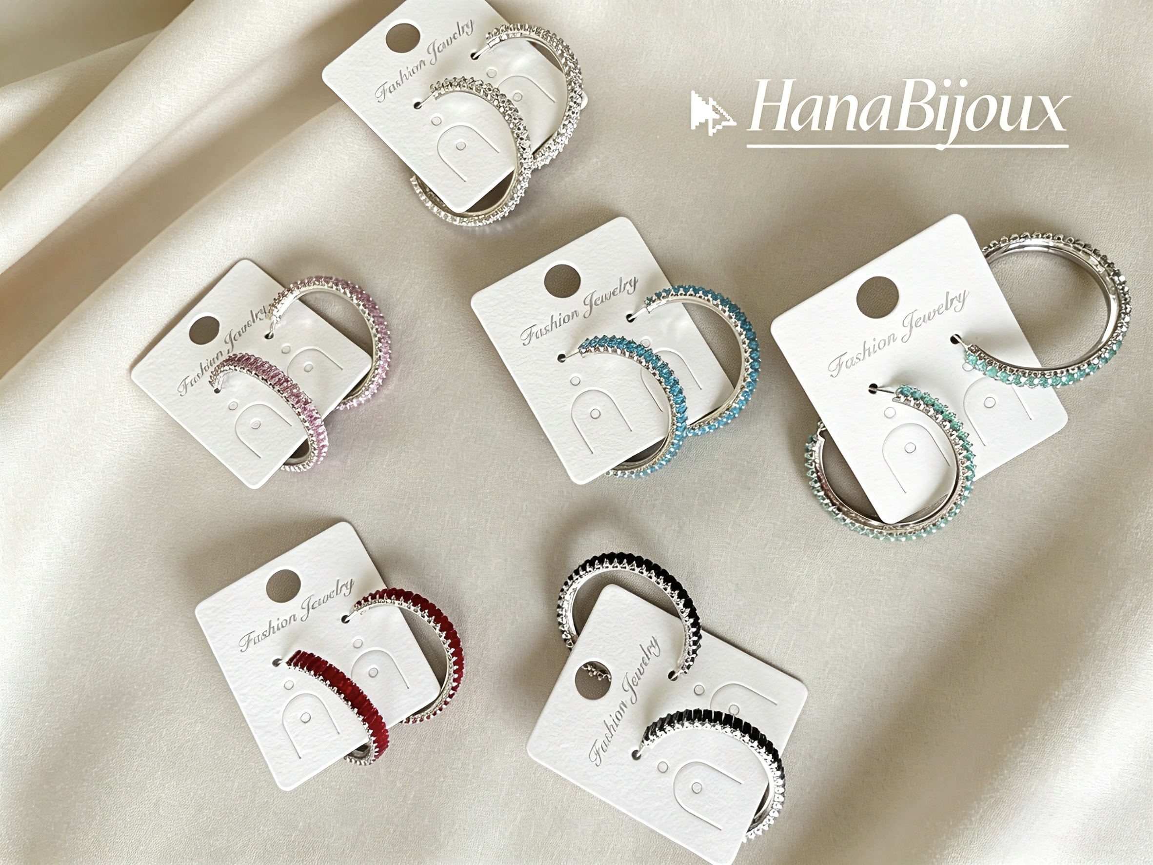 Wholesaler HANA BIJOUX - Gold hoop earrings with colored zircon.