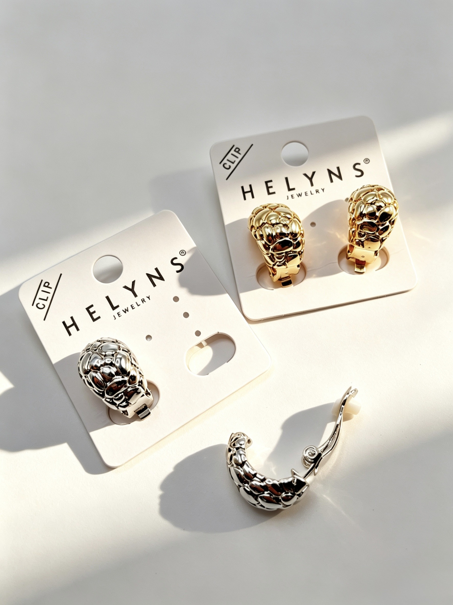 Wholesaler HANA BIJOUX - Open hoop clip-on earrings with a bold design