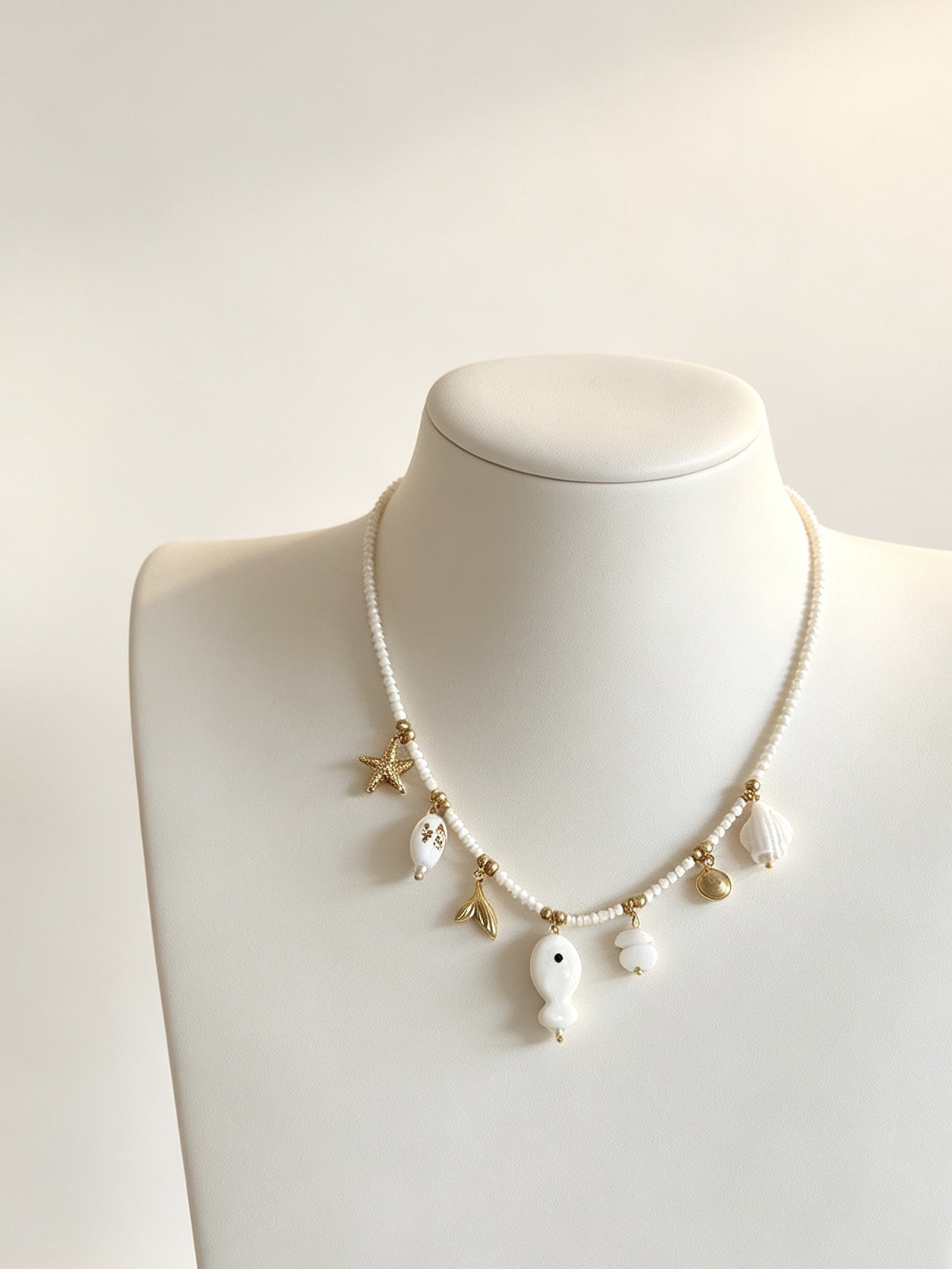 Grossista HANA BIJOUX - Collana boho con pesciolino e stelle marine