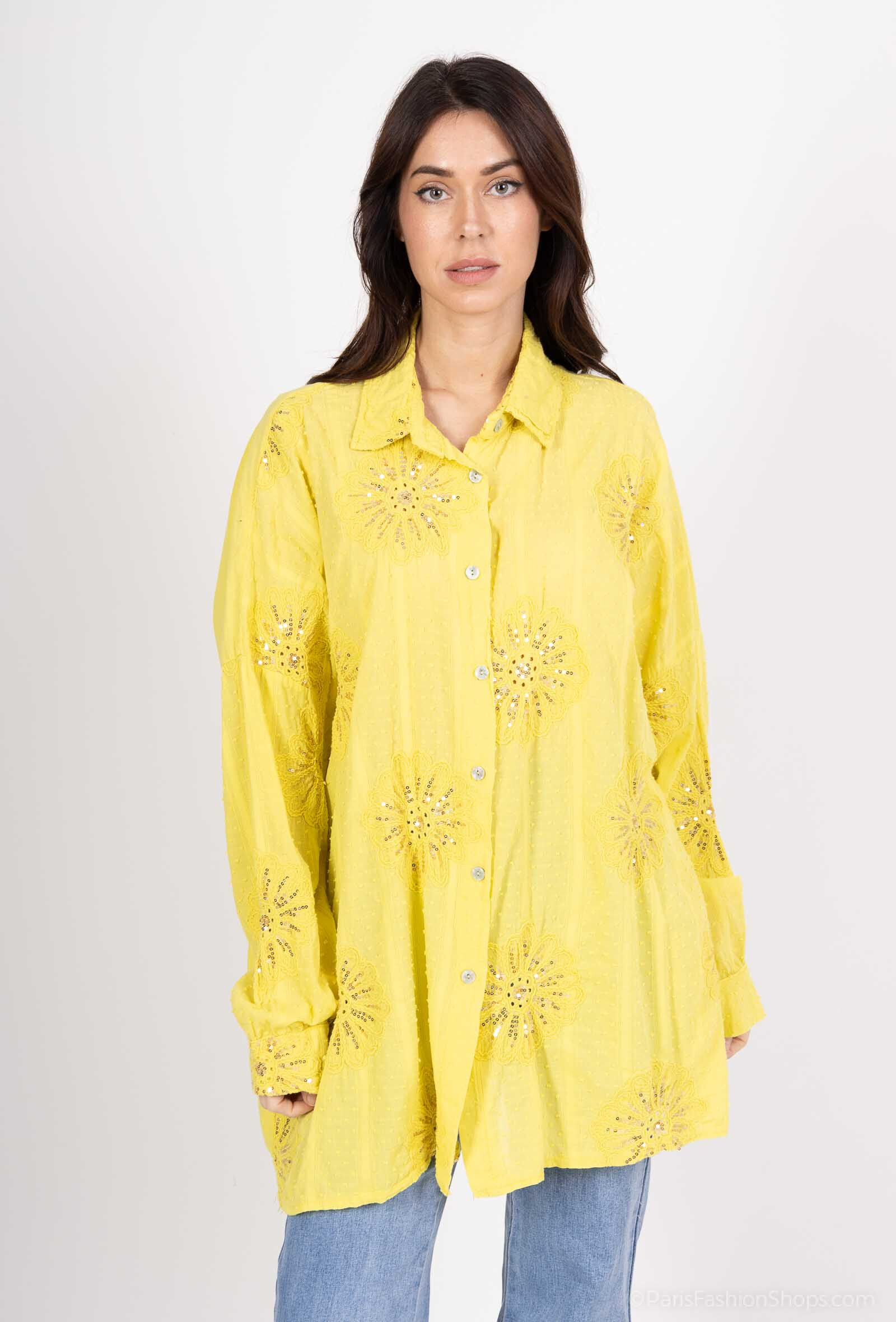 Fall for the aerial charm of this oversized shirt in cotton veil, ideal for those who like to mix comfort and elegance. Slightly transparent, it is sublimated by a delicate embroidery and fine sequins which add a luminous touch all in subtlety.

Its loose and fluid cut ensures a relaxed and modern silhouette, perfect to wear alone or superimposed. Long sleeves bring natural elegance, while the lightness of the cotton veil makes it an ideal piece for spring-summer.

Product details:

Fabric: soft, light and breathable cotton sail
Delicate embroidery with discreet sequins
Oversize cut, comfortable and trendy
Long sleeves with buttoned cuffs
Button closure on the front