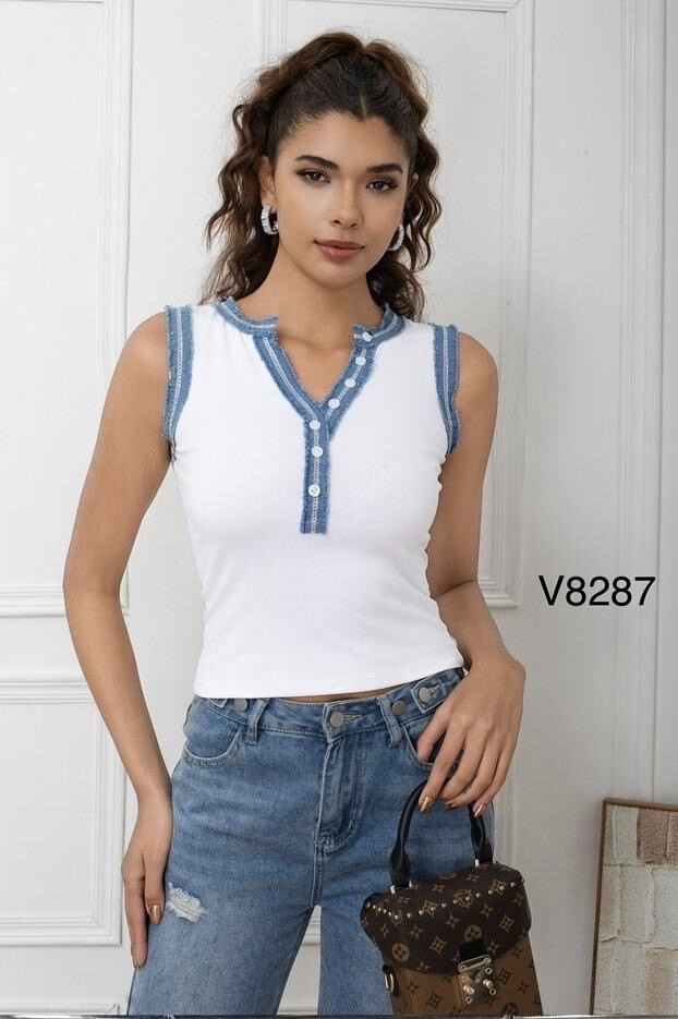 Grossiste HD Diffusion - Top blanc élégant parfait pour votre garde robe