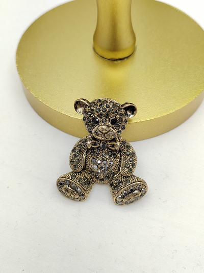 Grossiste I.L JOLI B - Broche nounours en métal fantaisie Grossiste I.L JOLI B - Broche nounours en métal fantaisie