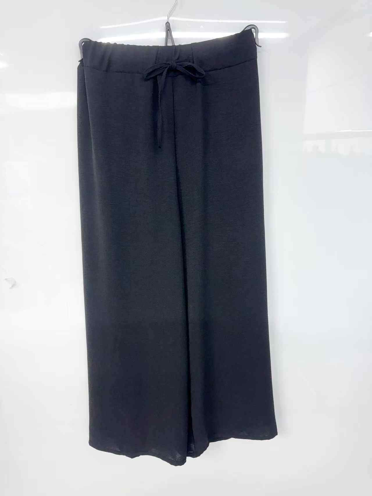 Grossiste I'Mod - Pantalon large fluide ceinturé en jazz