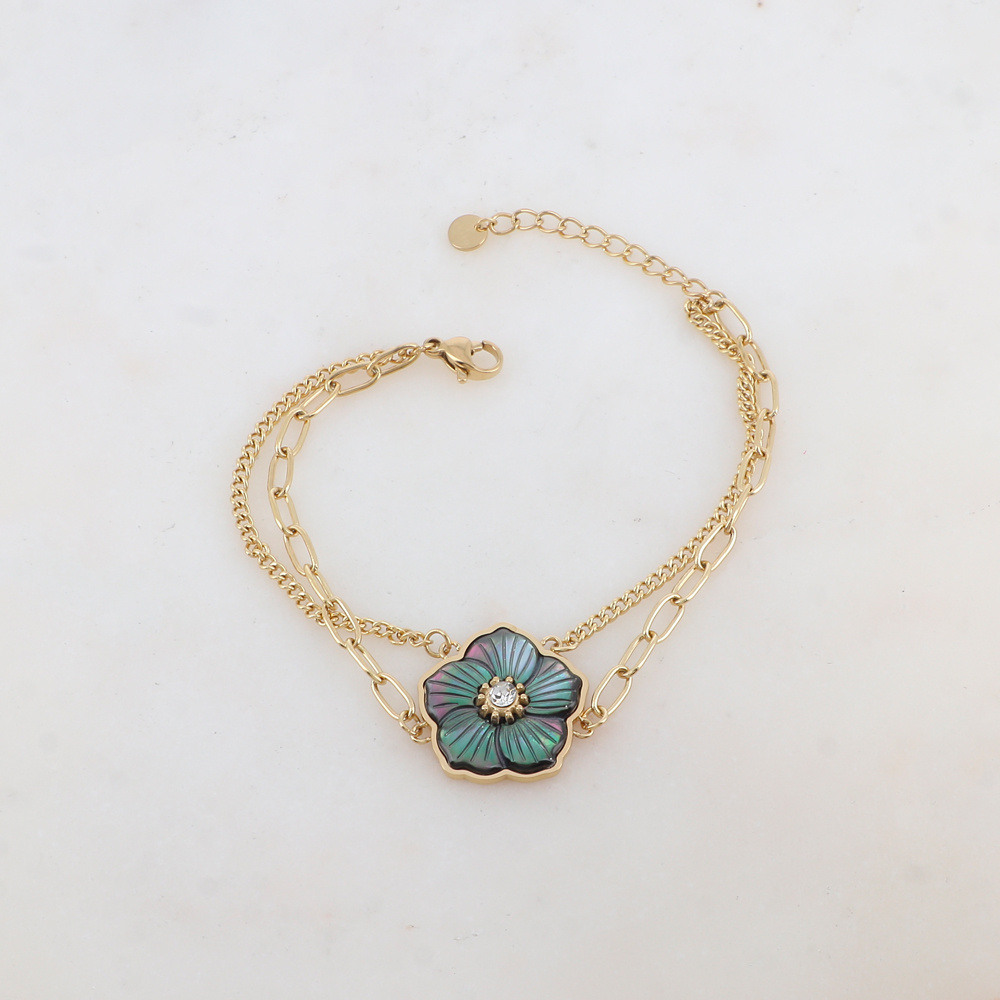 Wholesaler Ikita Paris - 2-row bracelet with mesh, mother-of-pearl flower pendant, rhinestones
