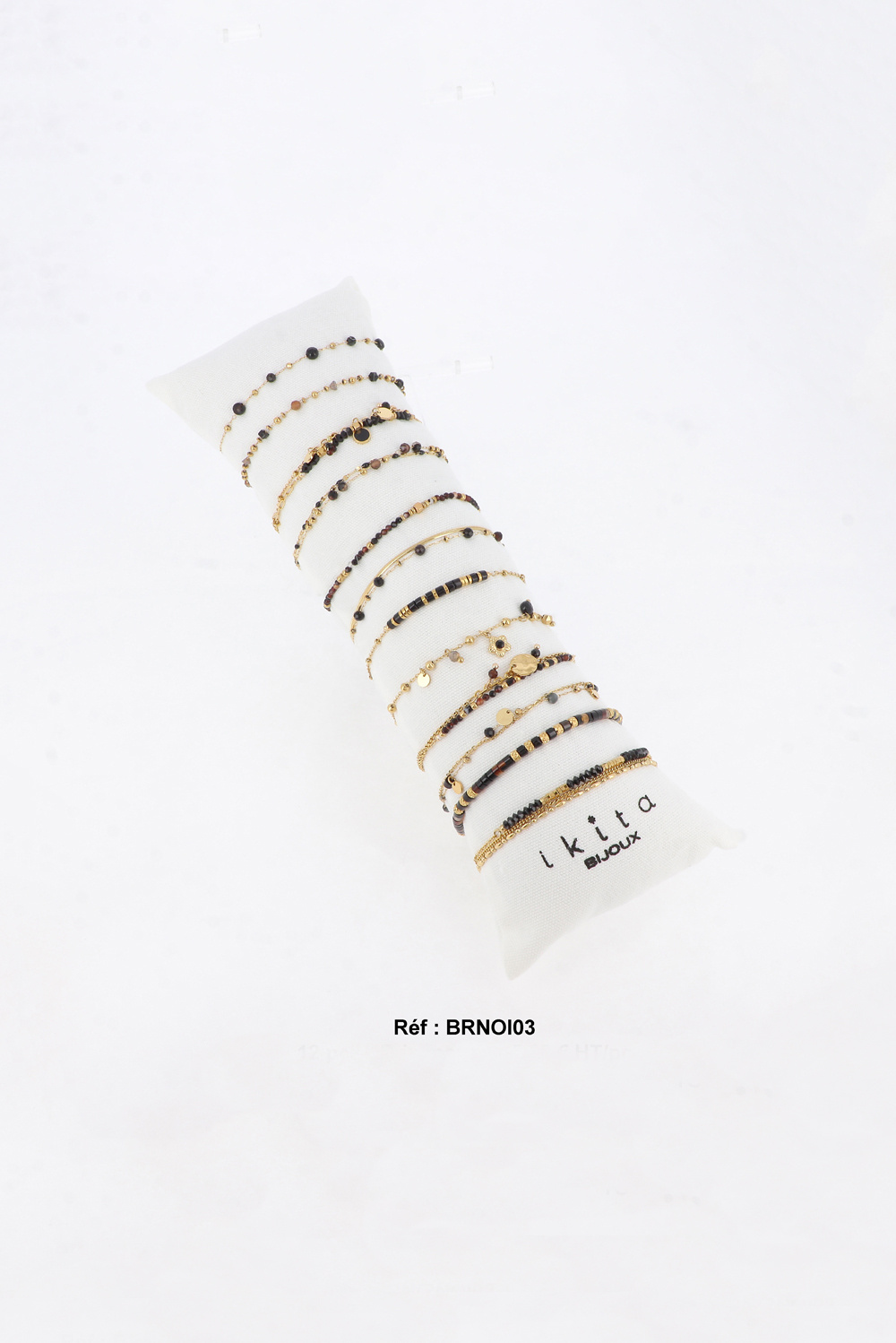 Großhändler Ikita Paris - Set mit 12 Armbändern. Kissen gratis. Durchschnittspreis: 5,00 € zzgl. MwSt.