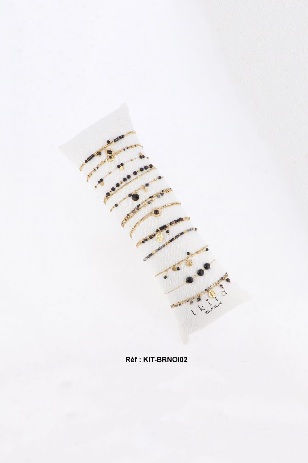 Großhändler Ikita Paris - Set mit 12 Armbändern. Kissen gratis. Durchschnittspreis: 5,00 € zzgl. MwSt.