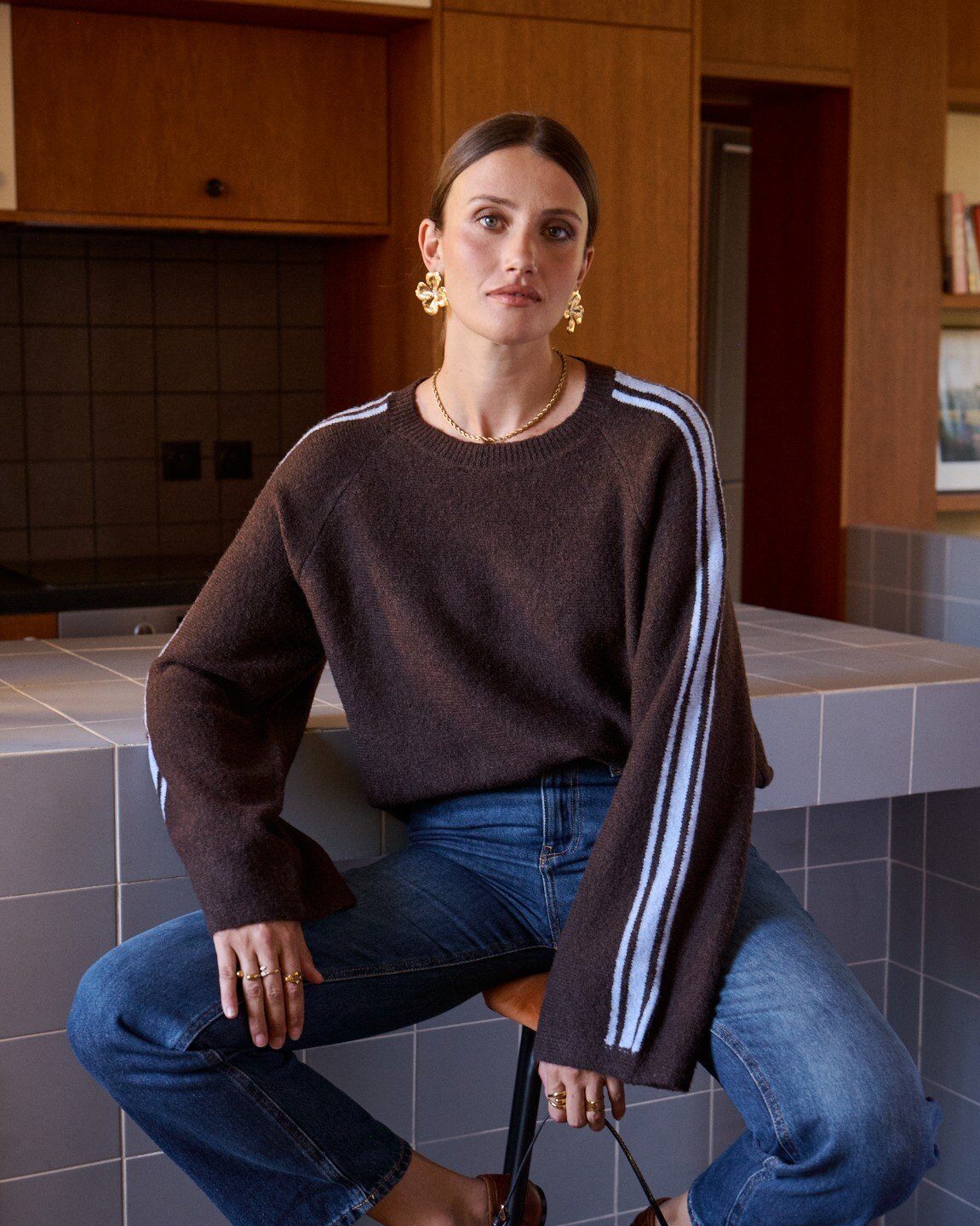 Wholesaler In April 1986 - Knit sweater with contrasting stripes.