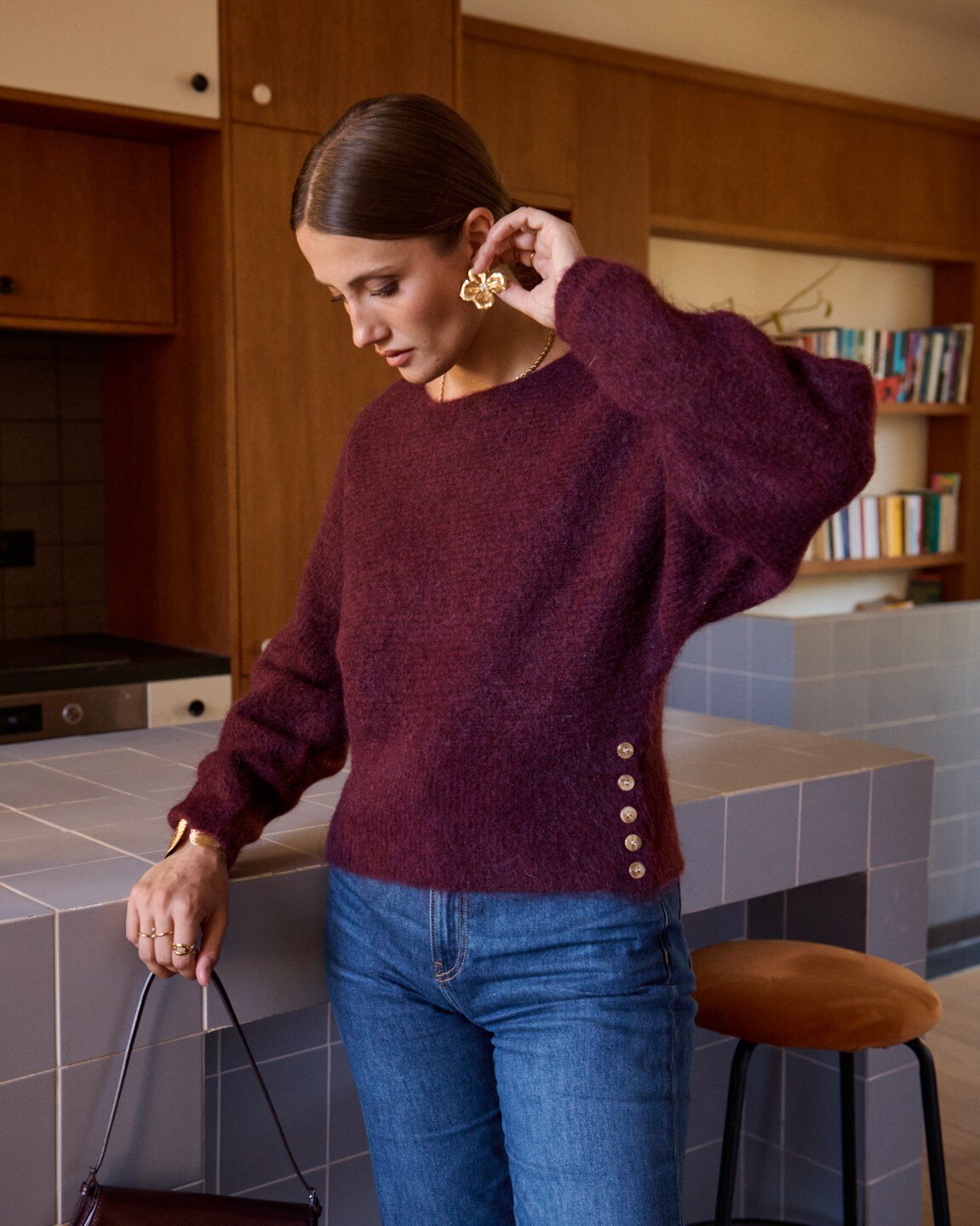 Wholesaler In April 1986 - Knit sweater with side buttons.
