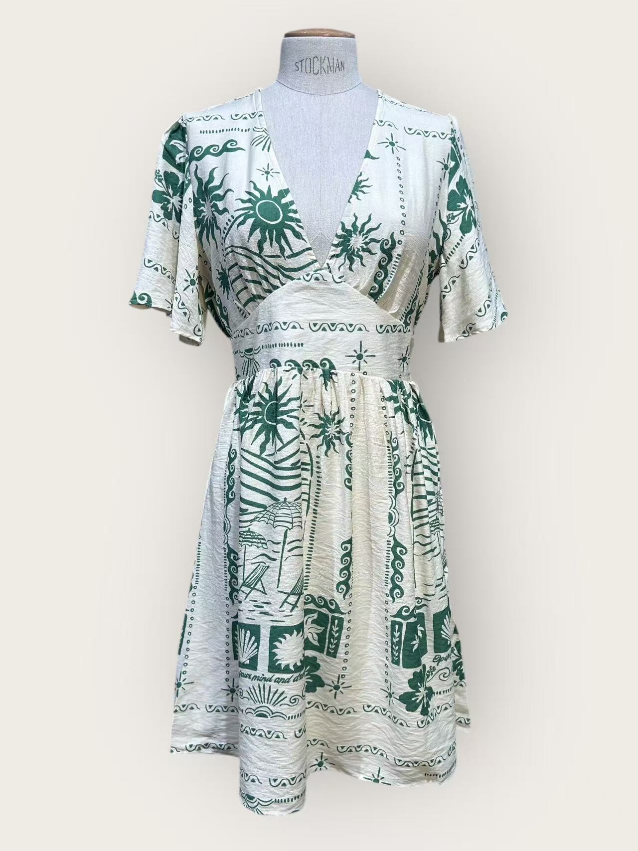 Wholesaler In April 1986 - Short dress with flattering and bright print.