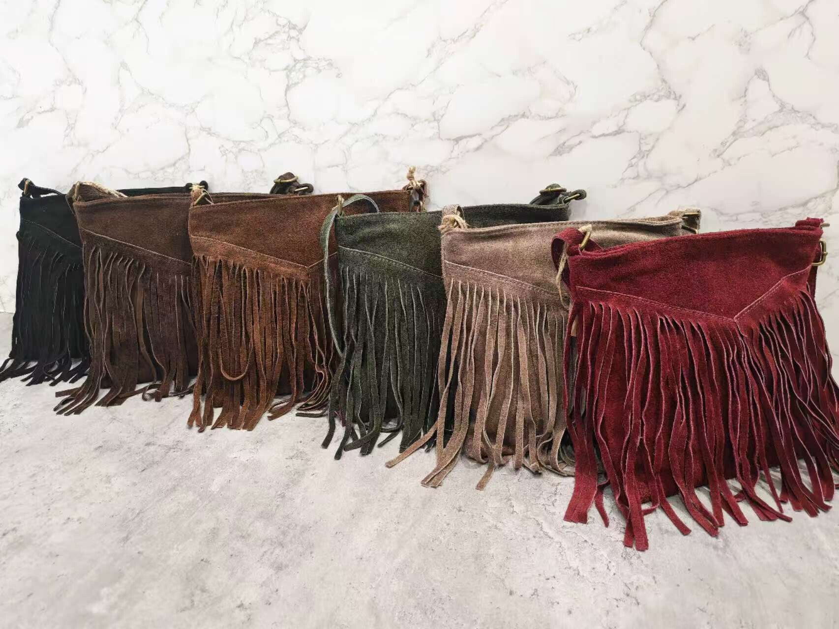 Grossista Ines Delaure - Pochette con frange in pelle