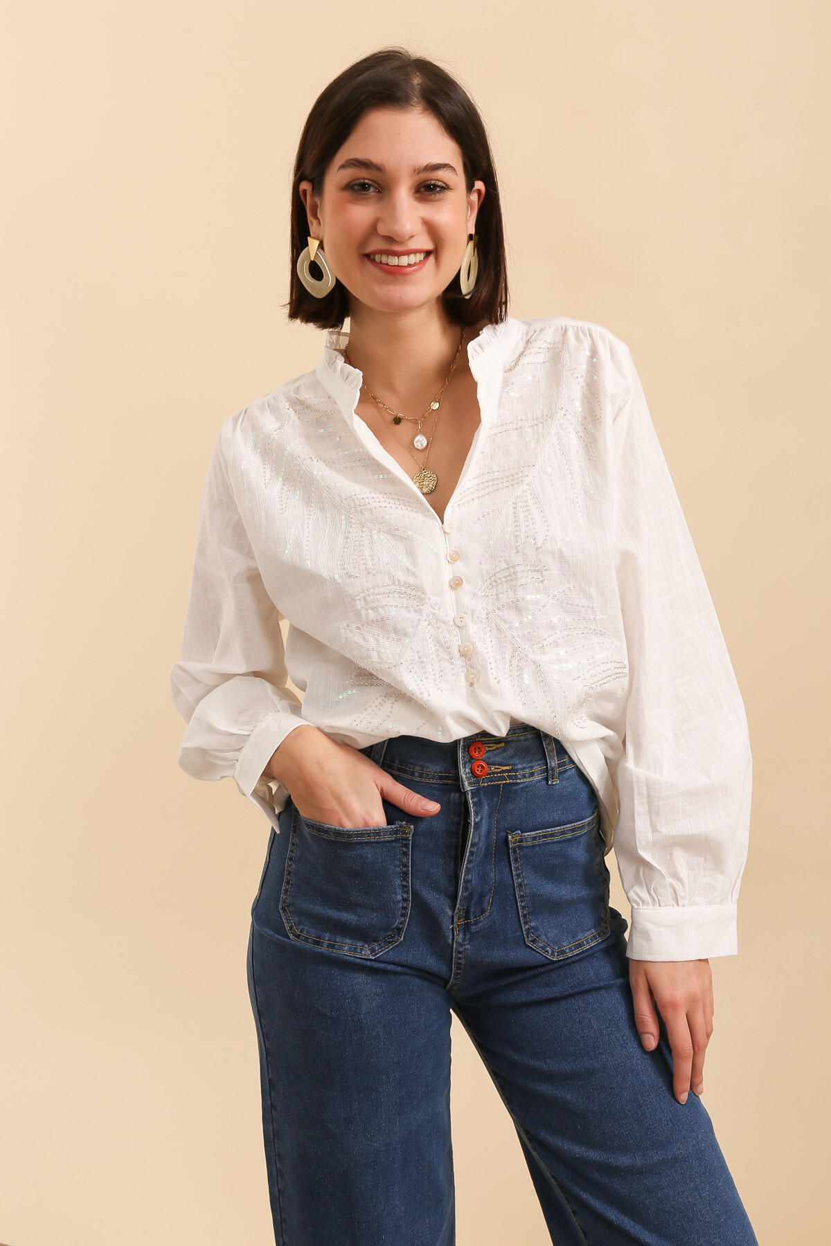 Wholesaler Inspiration Studio - Cotton shirt with embroidery decorated with beads and sequins.