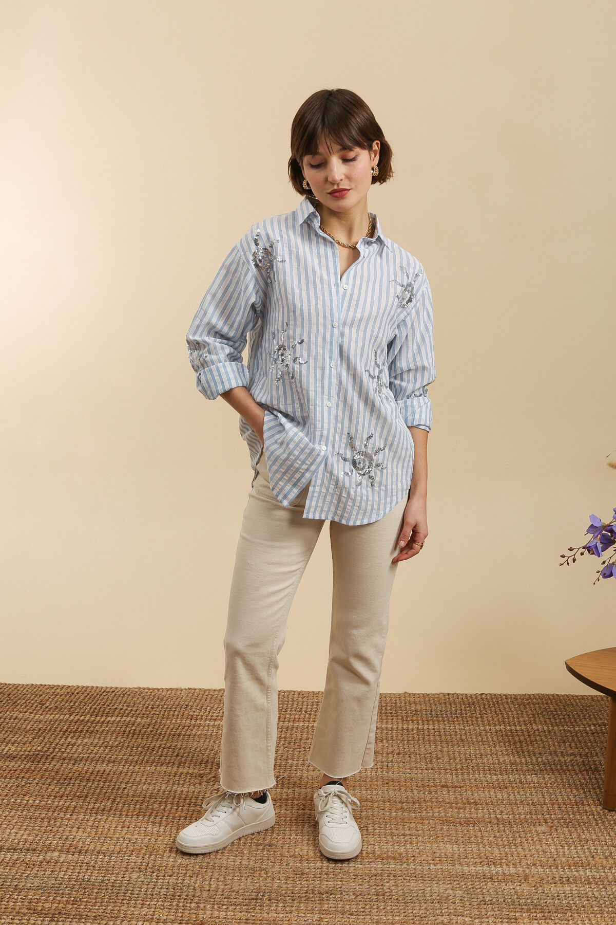 Wholesaler Inspiration Studio - Blue and white striped shirt with sun embroidery in sequins.