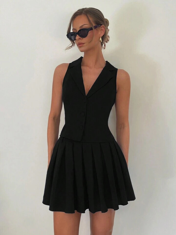Grossiste ISSYMA - Ensemble chic blazer sans manches avec jupe plissée