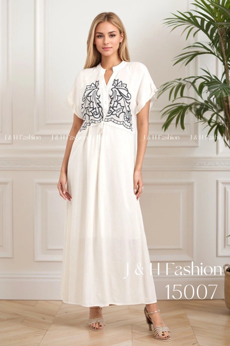 Mayorista J&H Fashion - Vestido largo de algodón fluido con cuello en V acampanado, bordado y cordón ajustable en la cintura