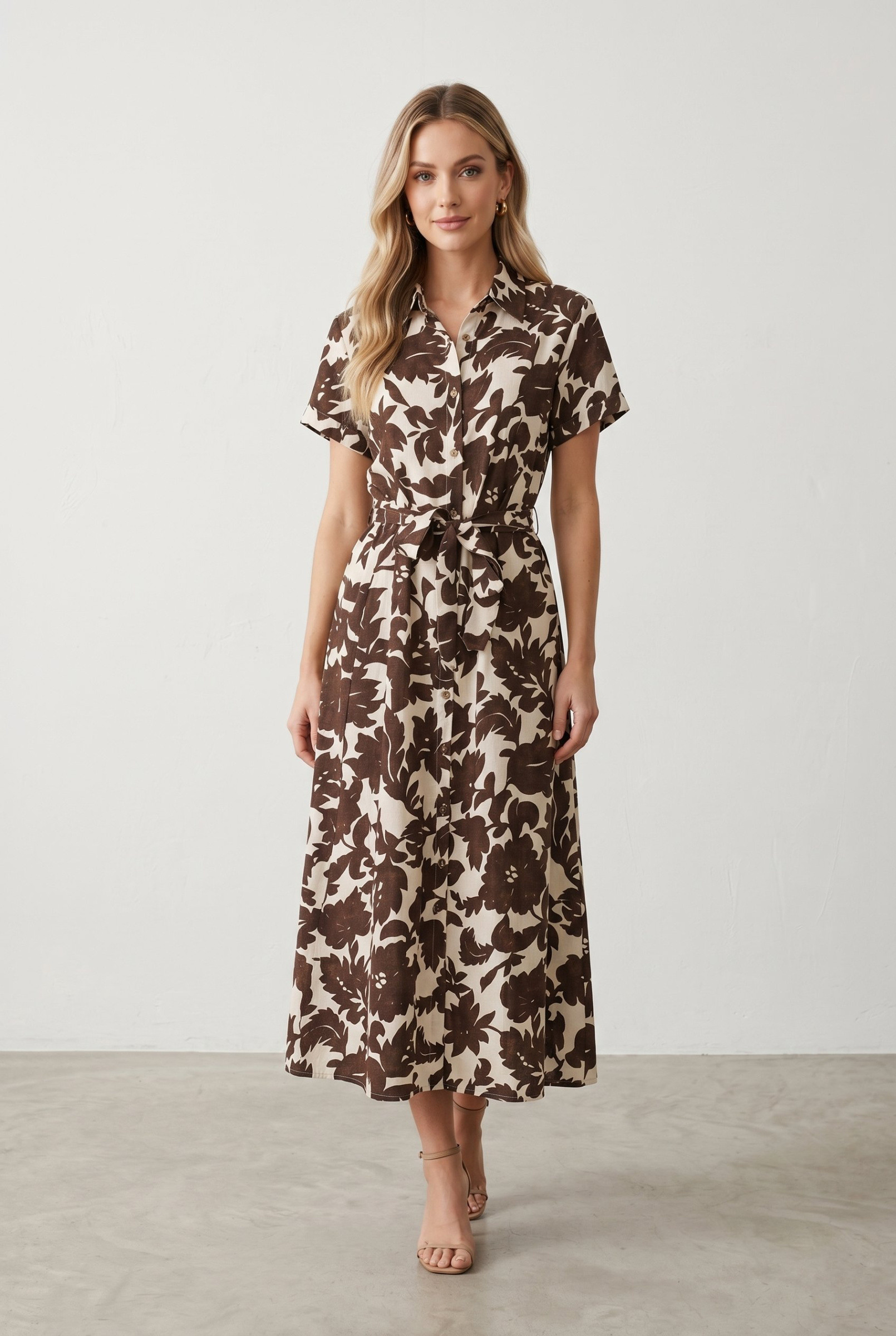 Mayorista J&H Fashion - Vestido midi estampado con mangas cortas, ceñido con un cinturón anudado en la cintura para una silueta elegante y fluida.