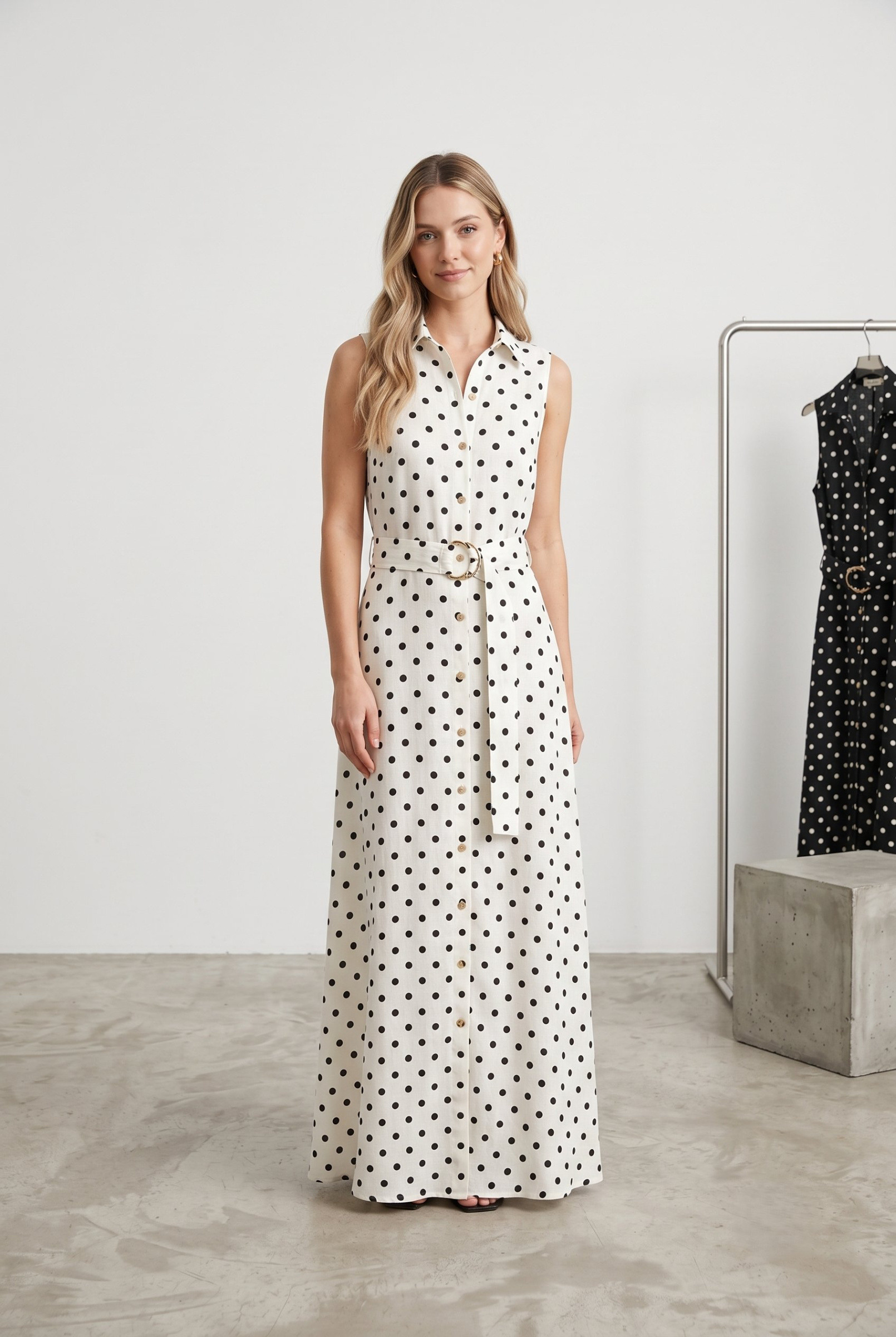 Mayorista J&H Fashion - Vestido midi sin mangas presenta un patrón de lunares atemporal, un diseño abotonado en el frente y un cinturón a juego que resalta delicadamente la