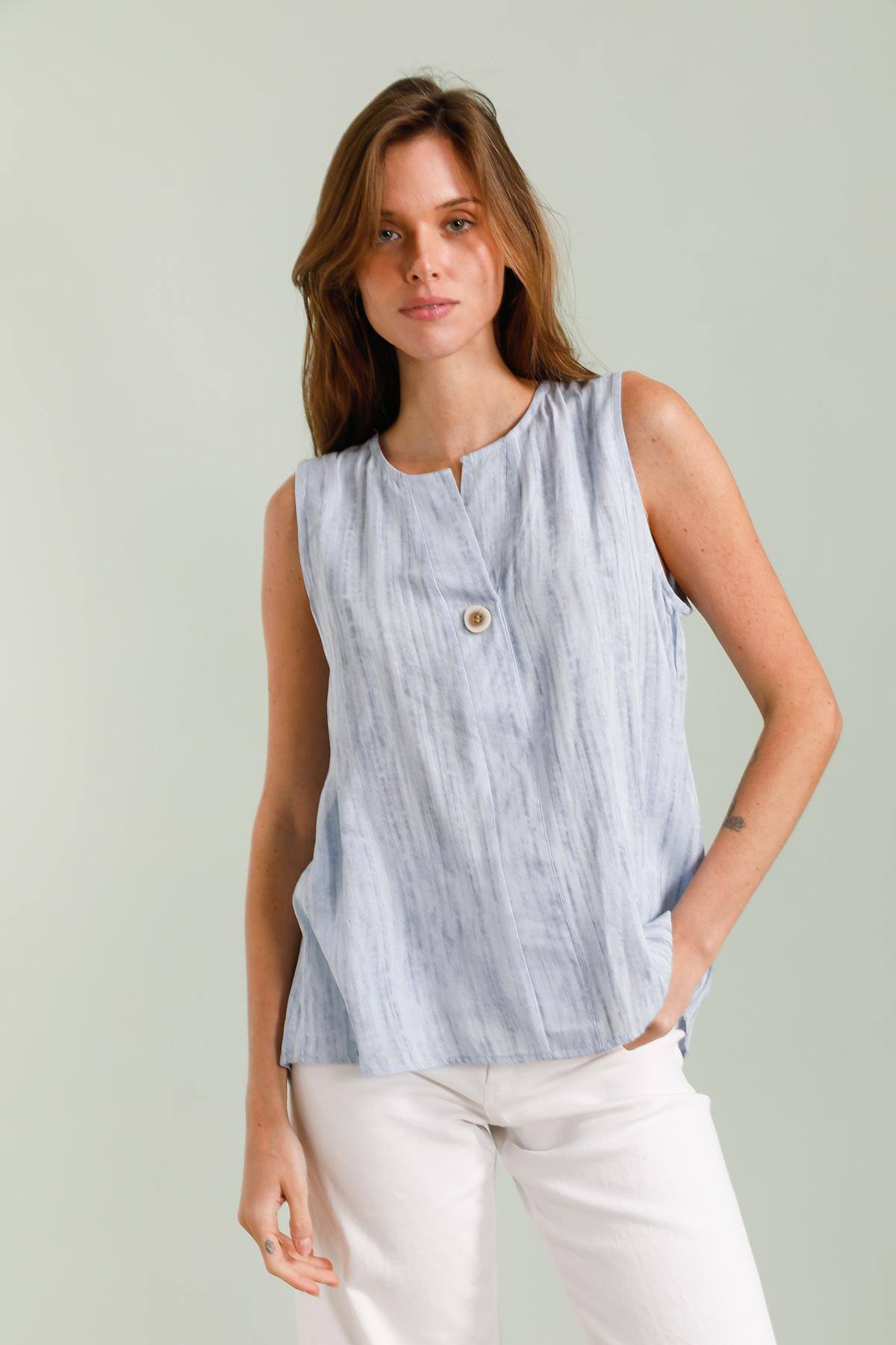 Grossista J&H Fashion - Blusa fluida e pantaloni di lino, tessuto stampato