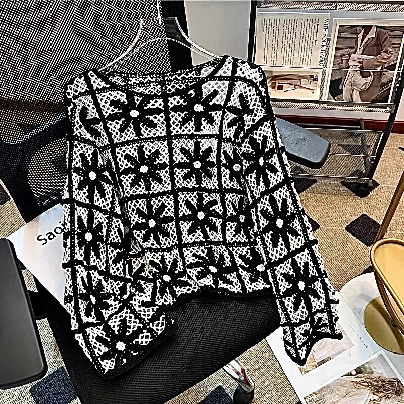Wholesaler J MODA - Black Floral Crochet Top – Sheer Elegance and Style