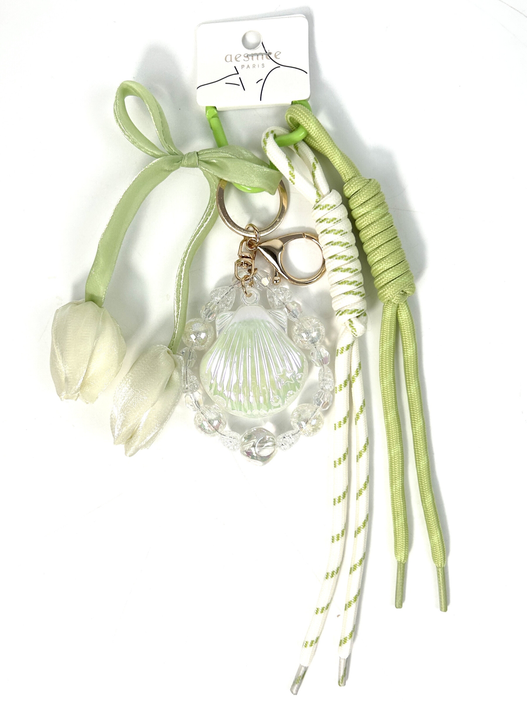 Grossiste Jade&Clarisse - PORTE CLÉ CHARMS SAC GRIGRI ULTRA MIGNON COQUILLAGE ET TULIPES VERTES PASTELSLE