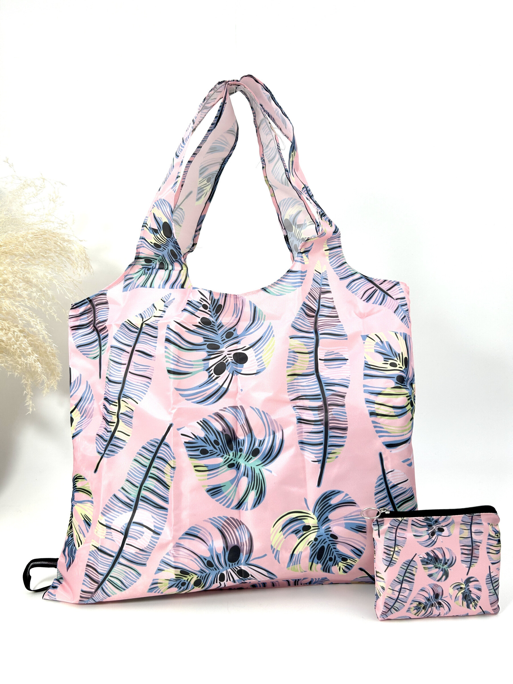 Wholesaler Jade&Clarisse - Racing bag with tropical plant print holds in the pocket
