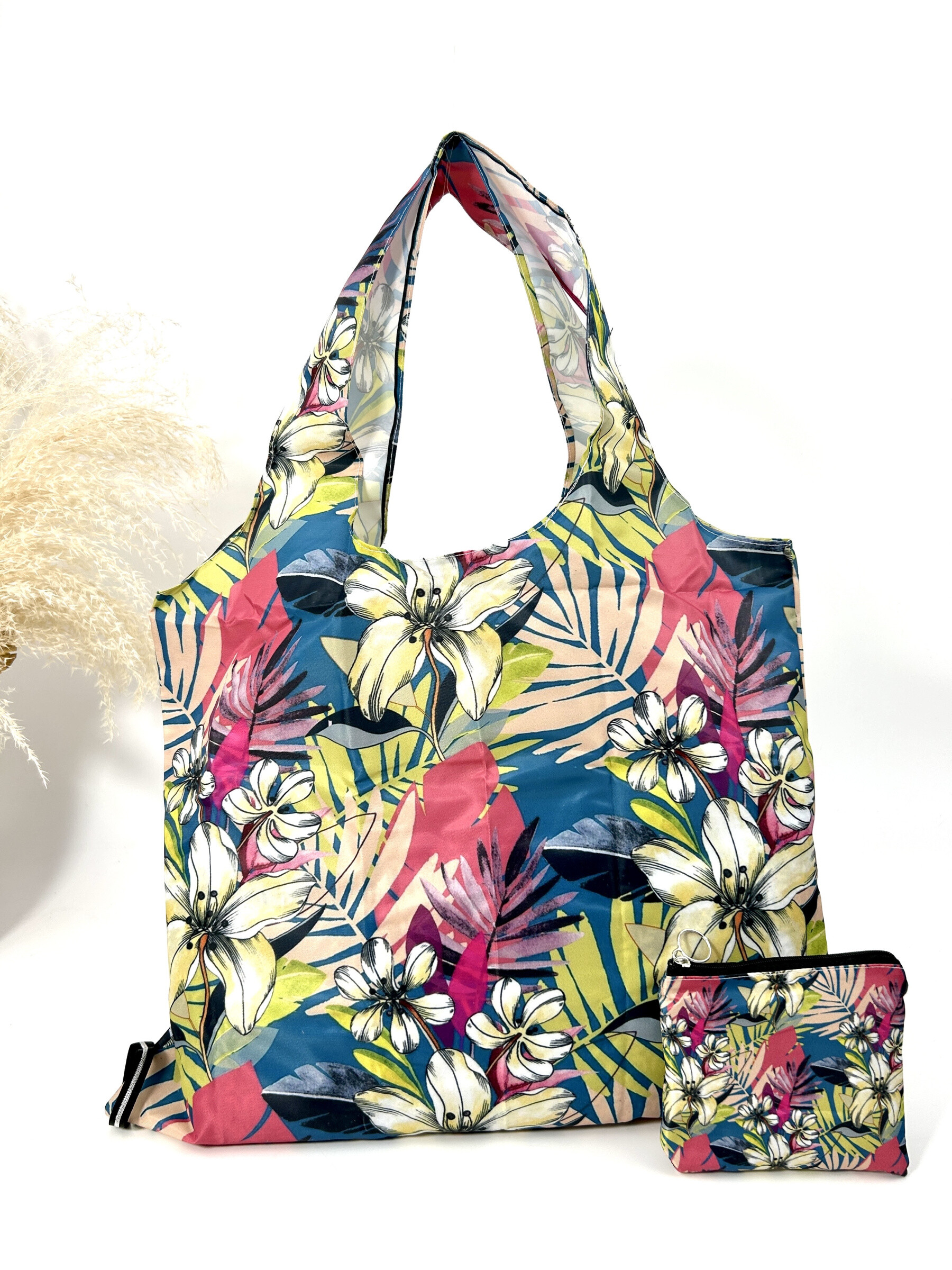 Wholesaler Jade&Clarisse - Racing bag with tropical plant print holds in the pocket
