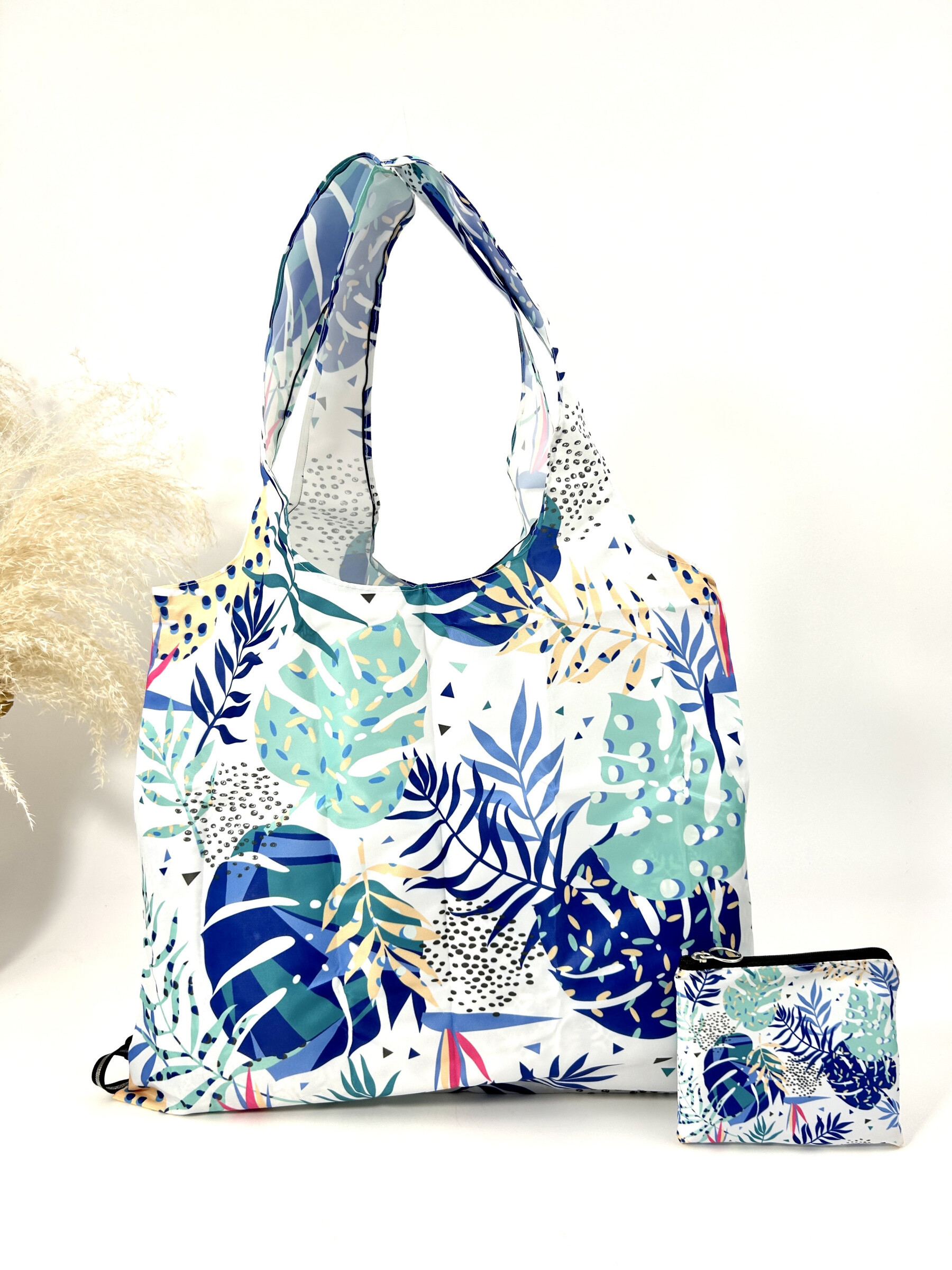 Wholesaler Jade&Clarisse - Racing bag with tropical plant print holds in the pocket