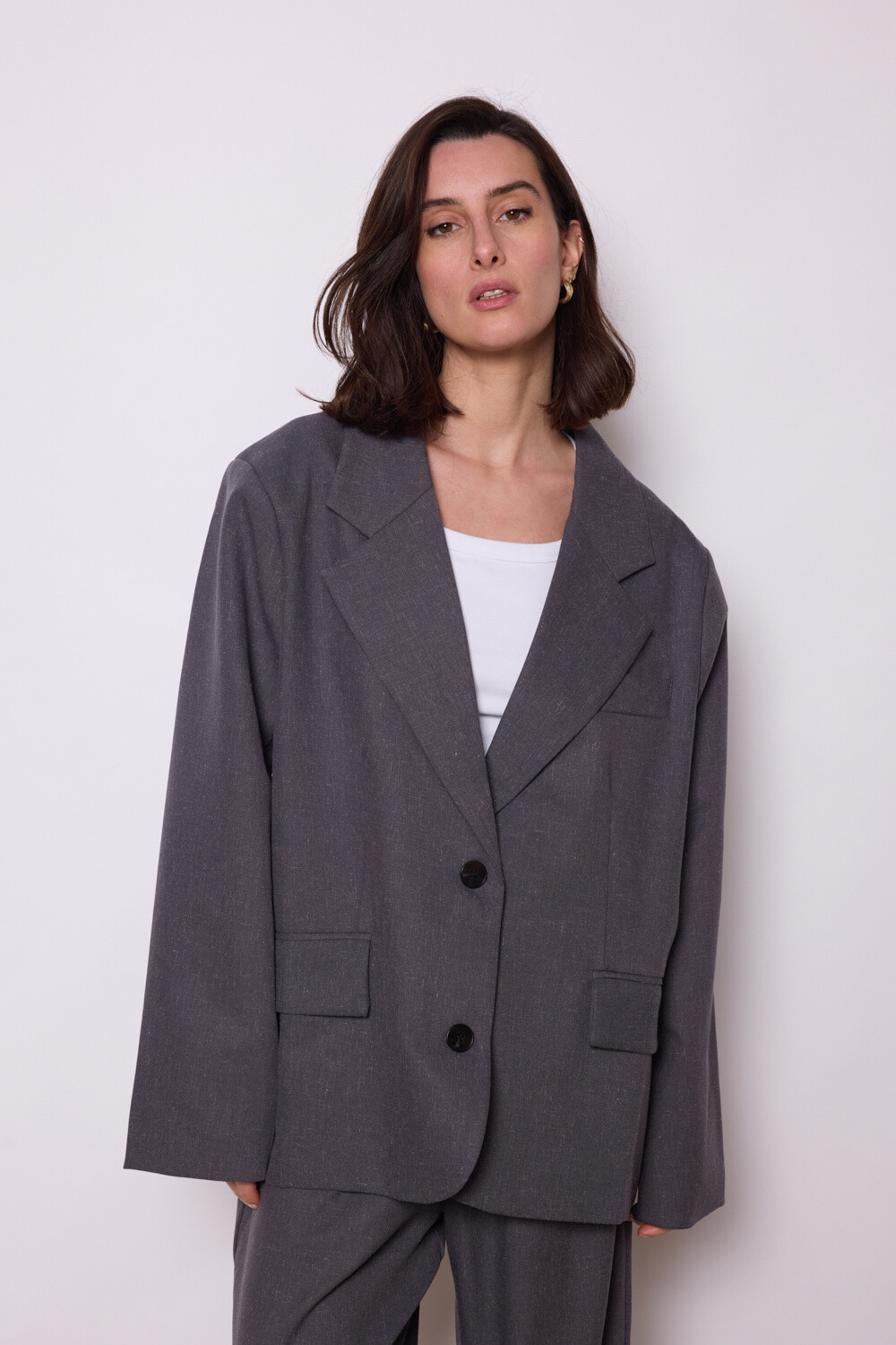 Grossista JCL Paris - Blazer oversize in beige chiaro per un look elegante