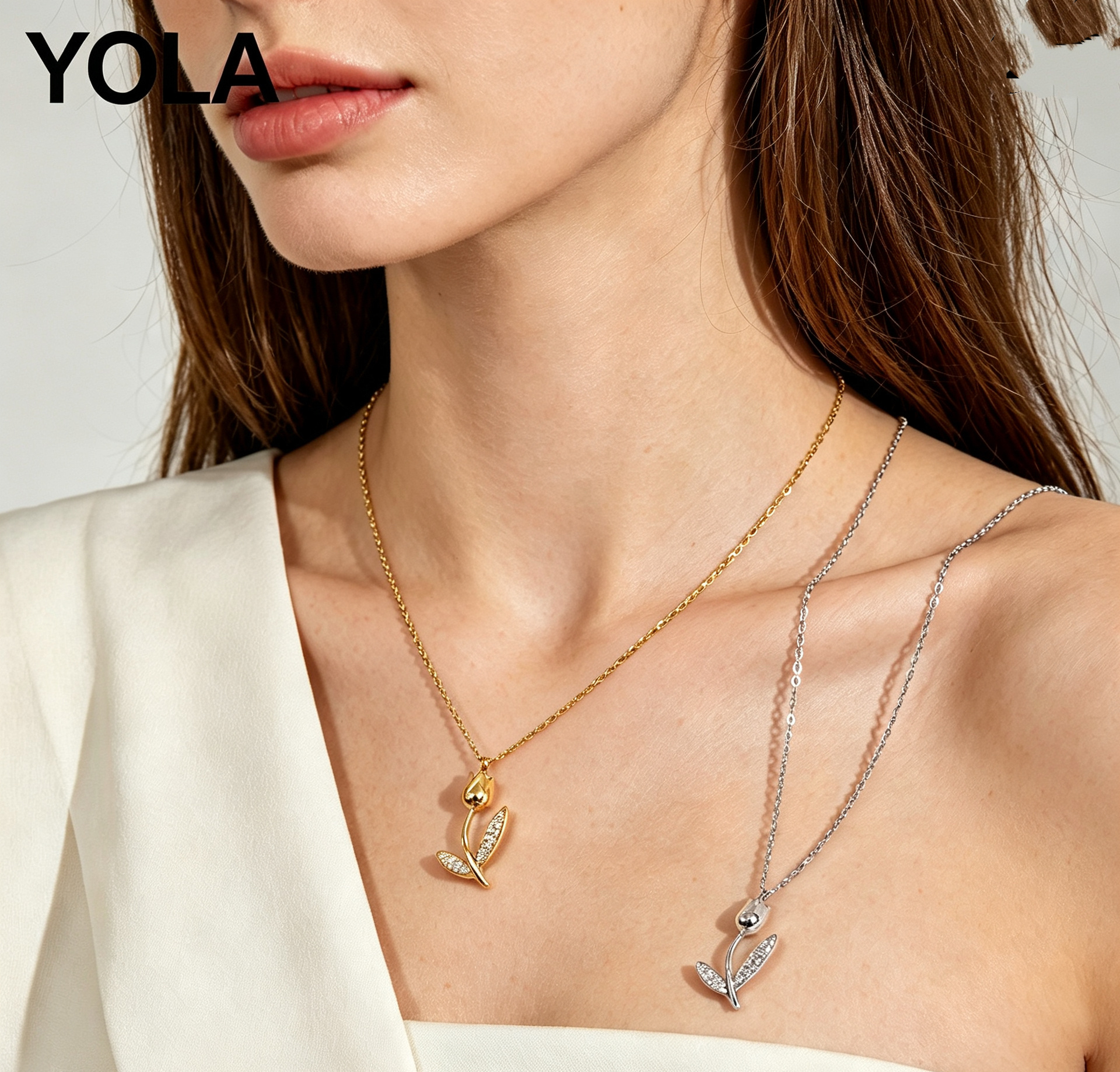Grossiste JESSICA - Voici un collier fin avec un pendentif en forme de fleur de tulipe, fabriqué en acier inoxydable. Le collier utilise une chaîne fine et simple en forme de O, avec un pendentif en forme de fleur de tulipe en 3D, et des feuilles incrustées de petits diamant