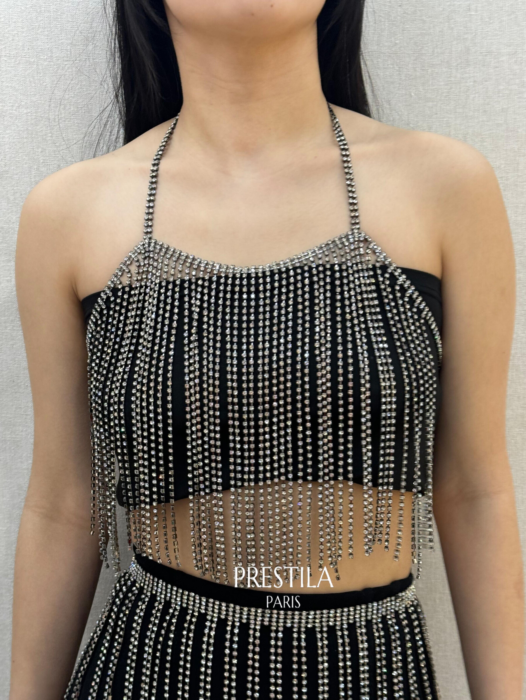 Grossista JH STORE - Top da donna con strass lucidi