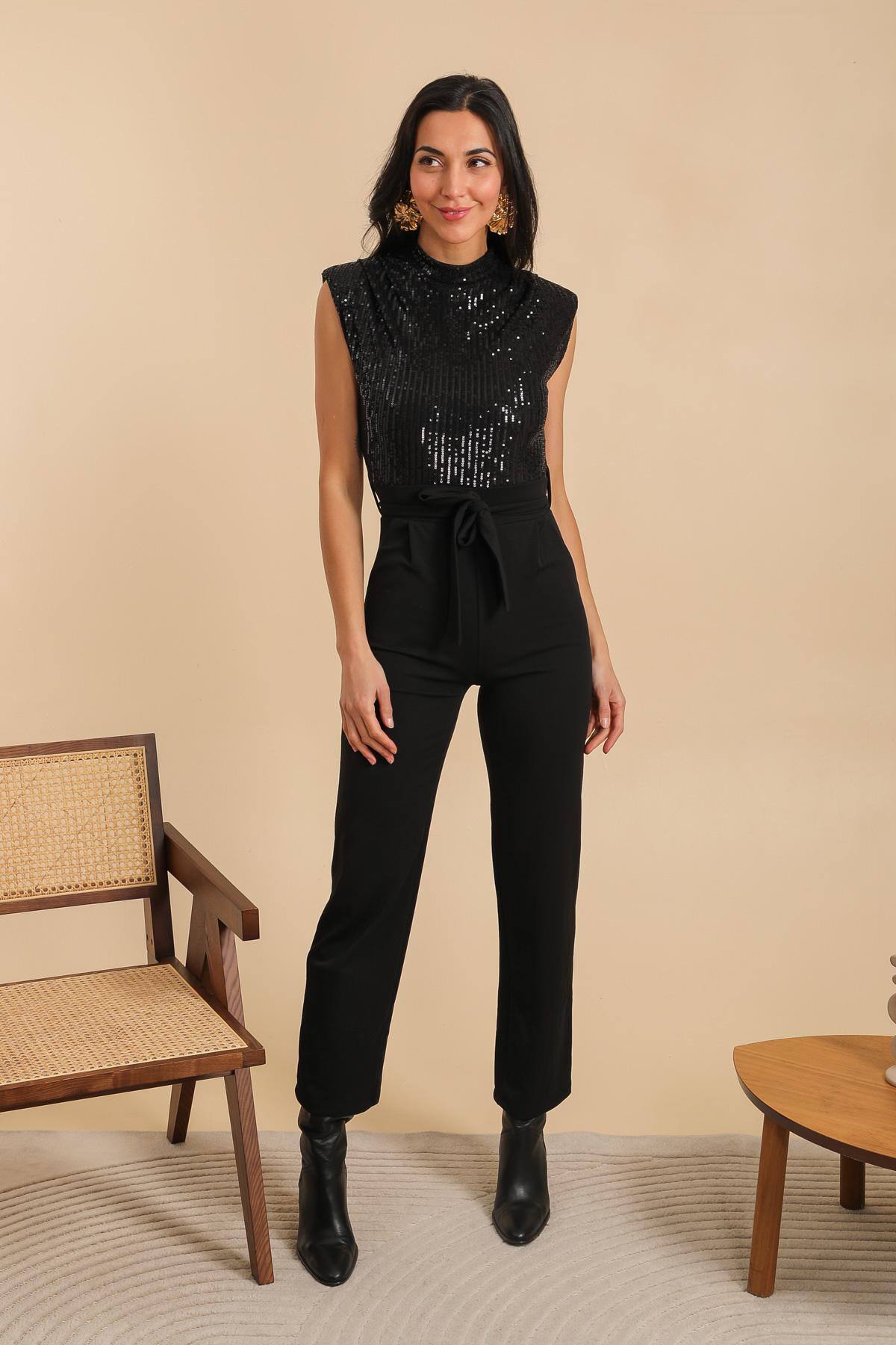 Wholesaler JOLIFLY - Chic black sequin jumpsuit – elegance and evening allure