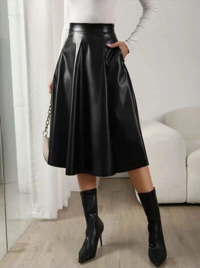 Grossiste JOLIFLY - Jupe évasée en simili cuir – Élégance intemporelle Grossiste JOLIFLY - Jupe évasée en simili cuir – Élégance intemporelle