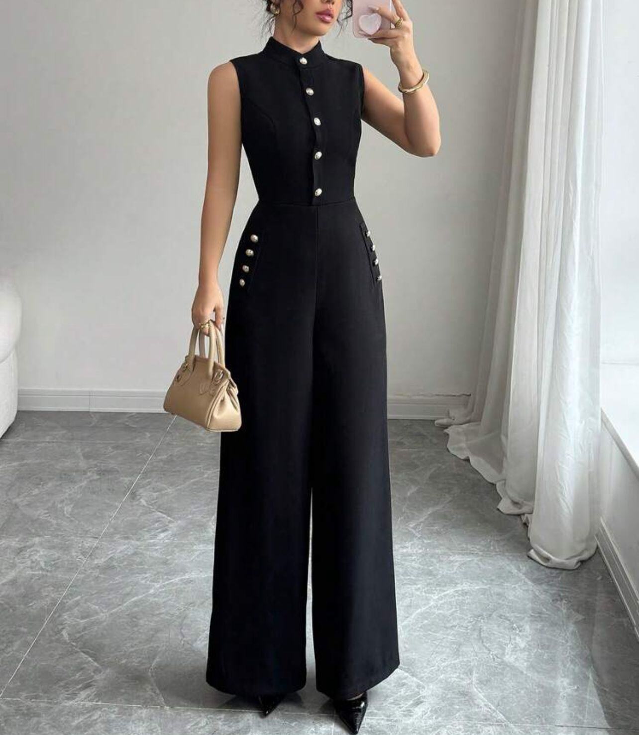 Wholesaler JOLIFLY - Sleeveless elegant black jumpsuit