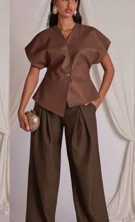 Mayorista Kaia - Blusa de cuero sintético