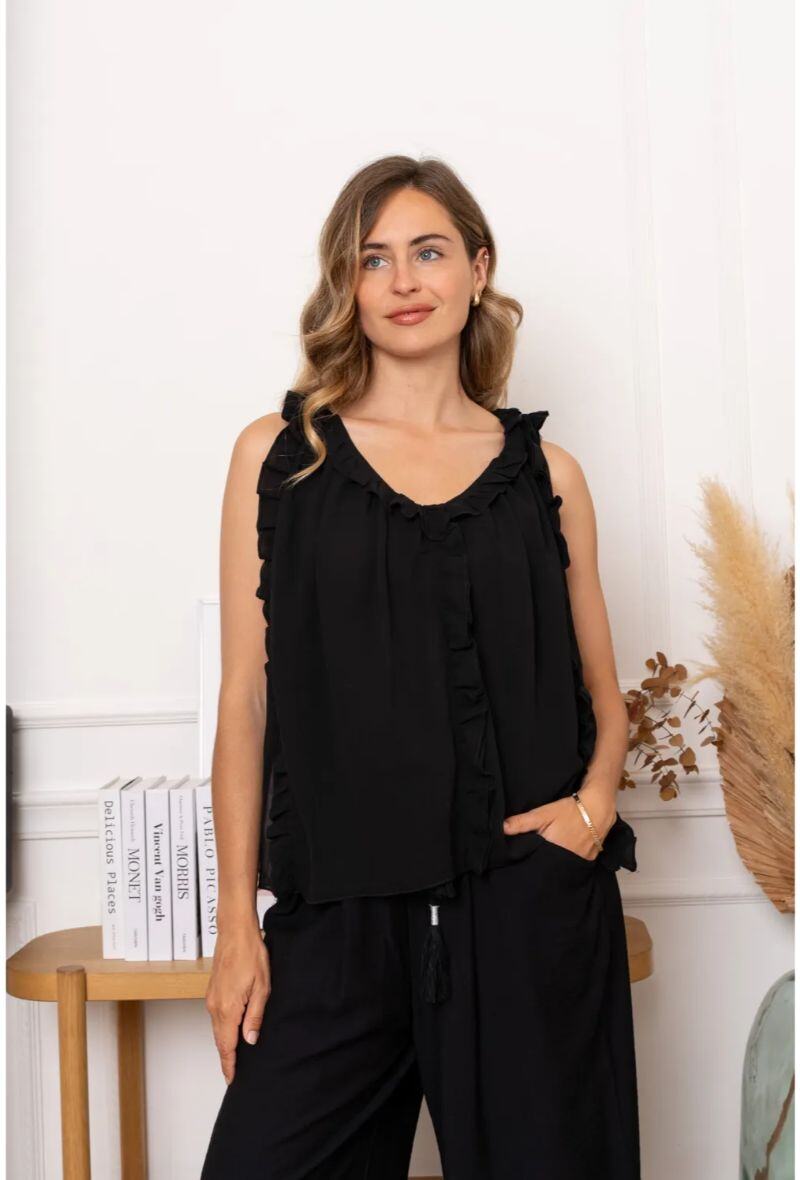Lightweight polyester top, perfect for summer 2025, made in China, great for warm weather.
